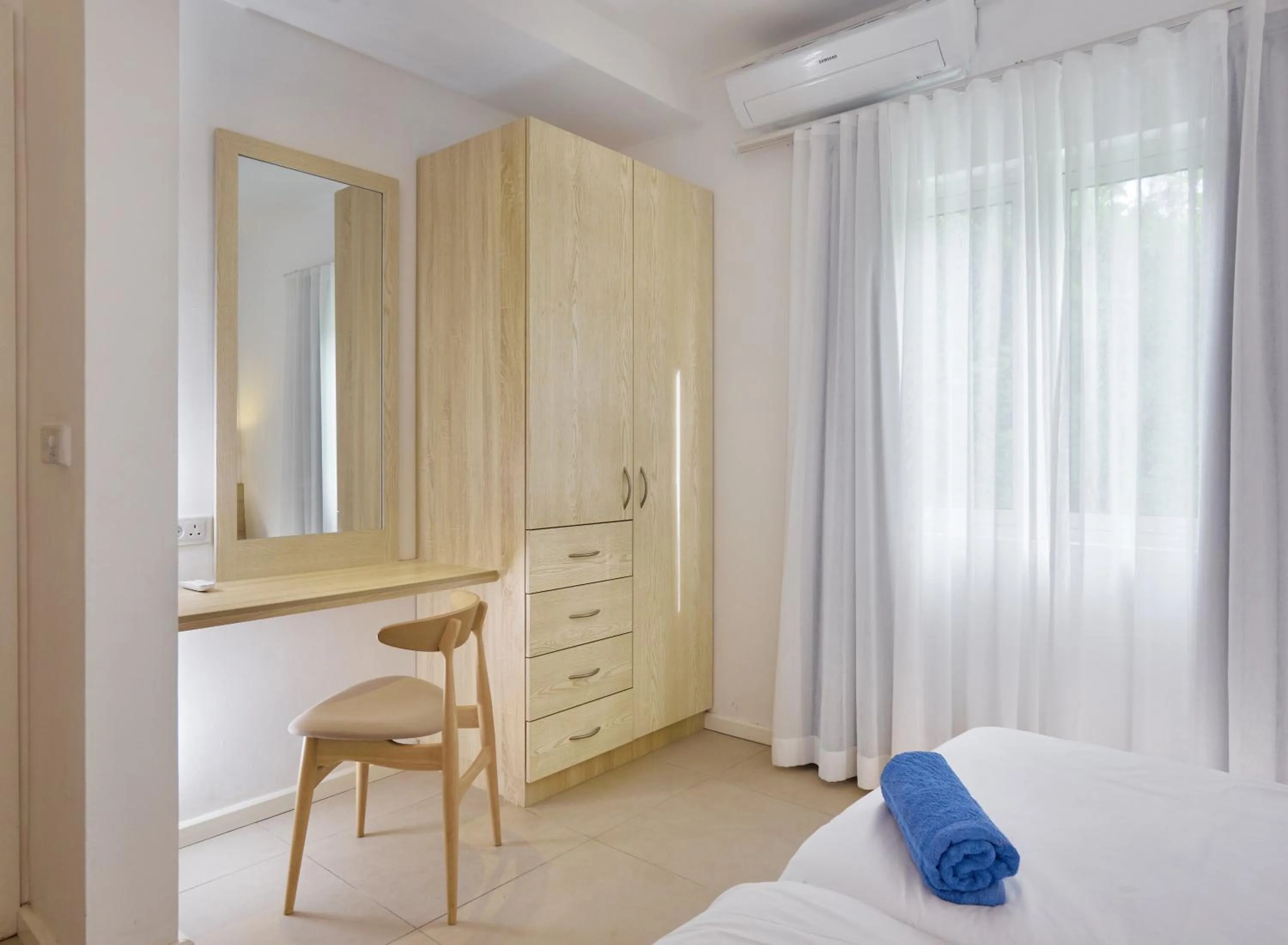 Seating area, Bed in Le Beachclub