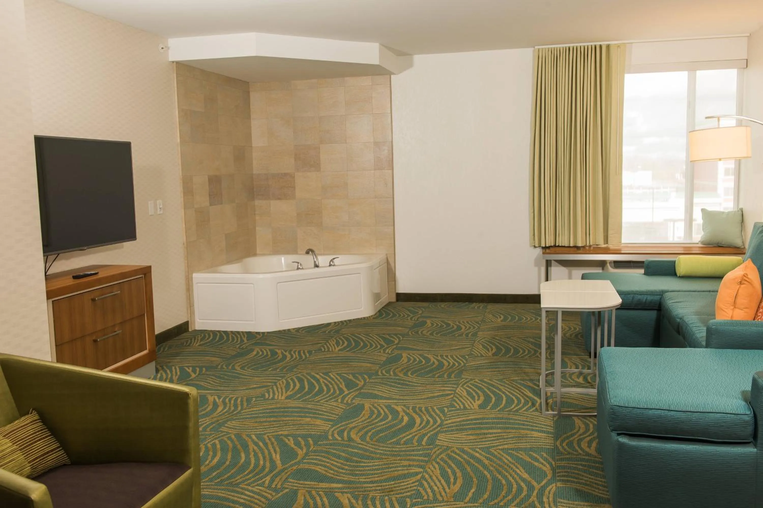 Swimming pool in SpringHill Suites by Marriott Buffalo Airport
