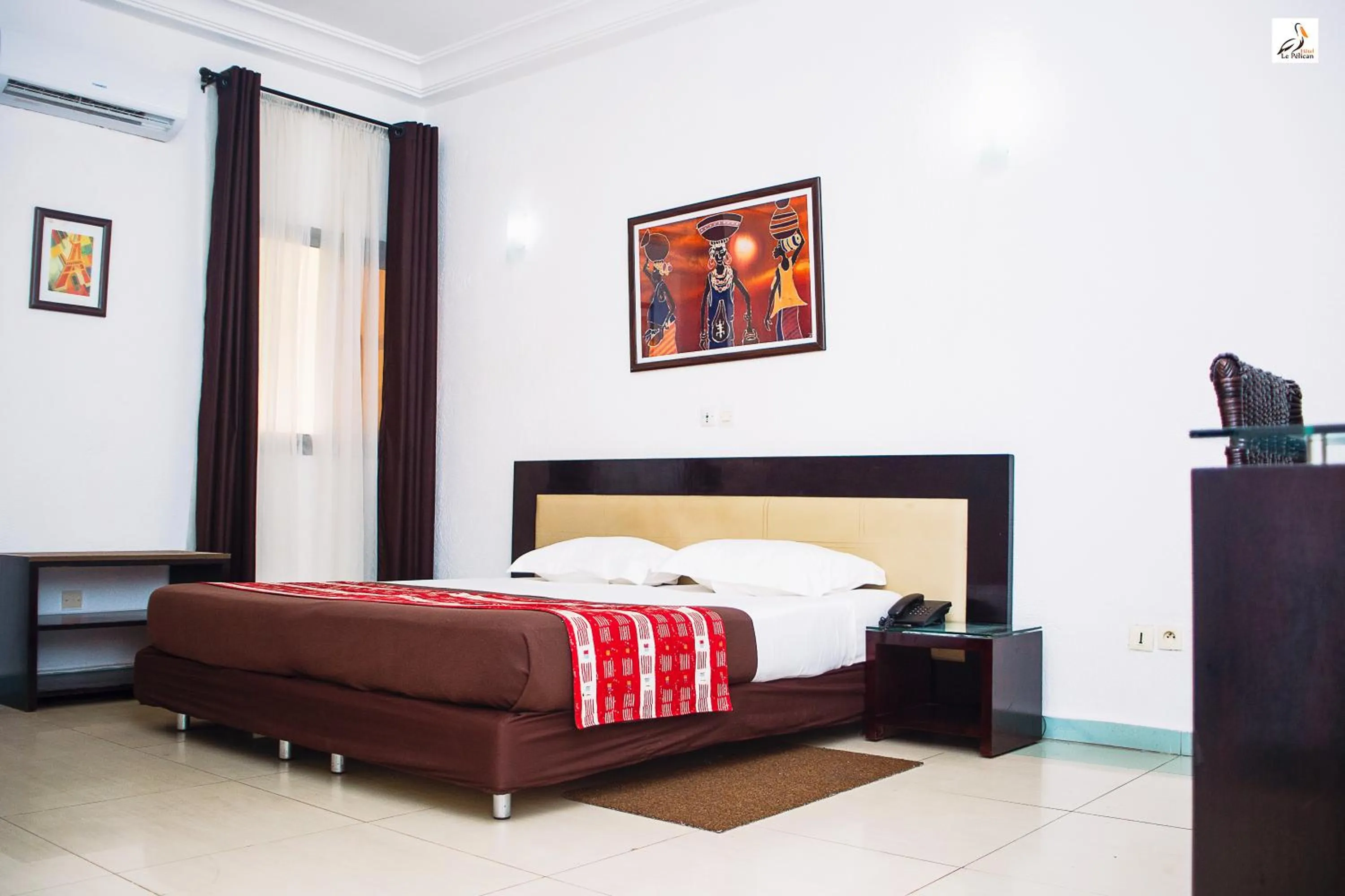 Bed in Hotel le Pelican