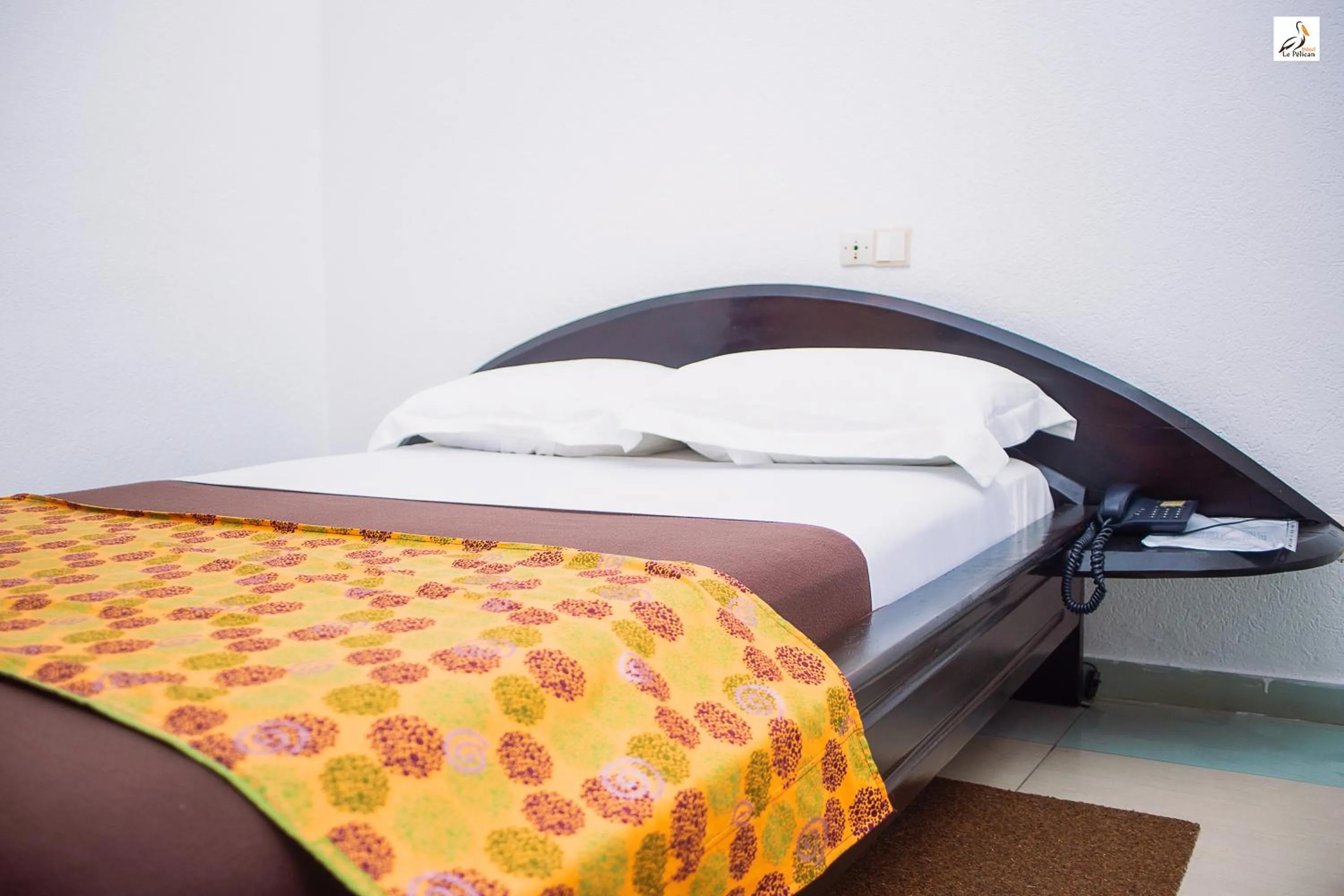 Bed in Hotel le Pelican
