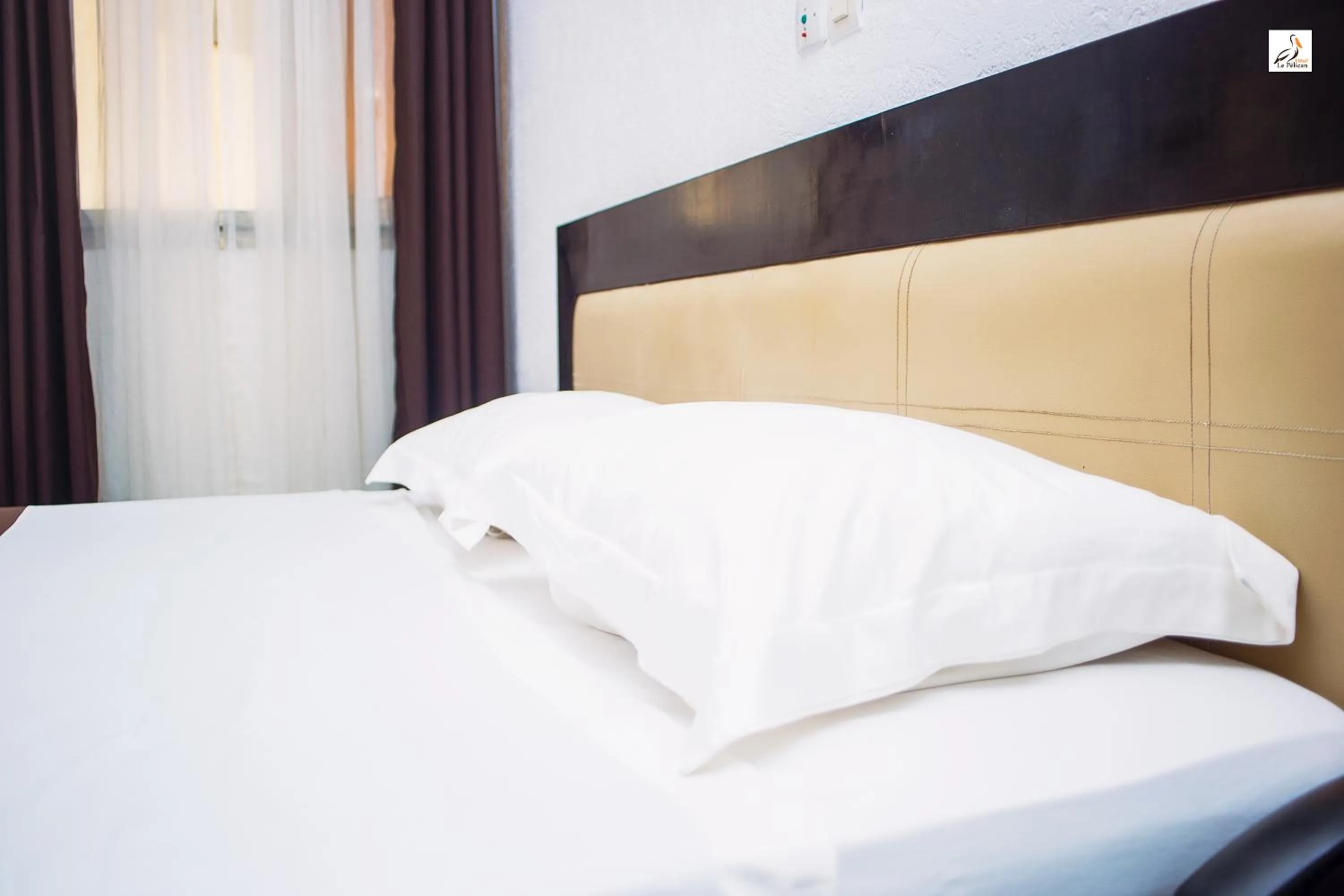 Bed in Hotel le Pelican