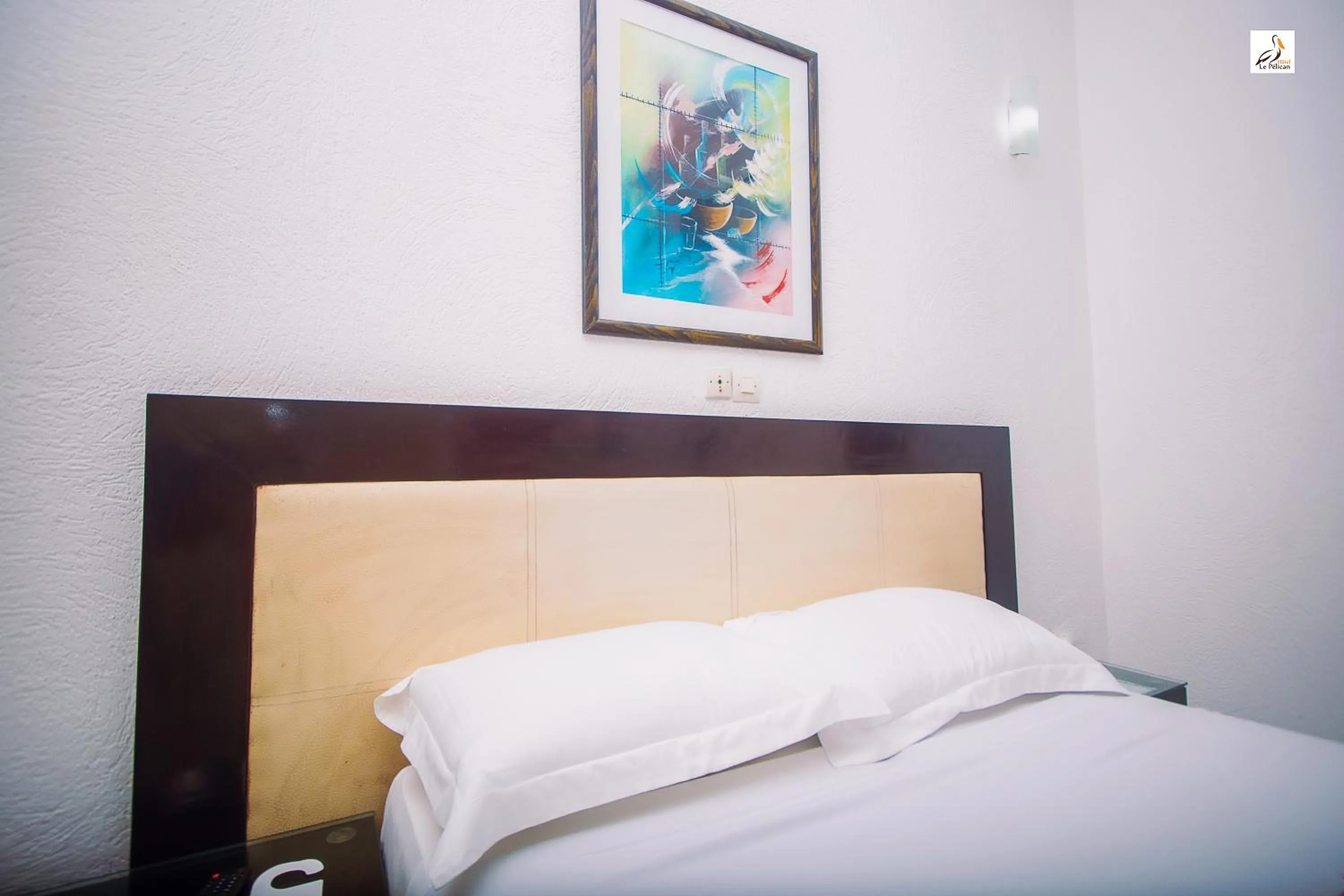 Bed in Hotel le Pelican