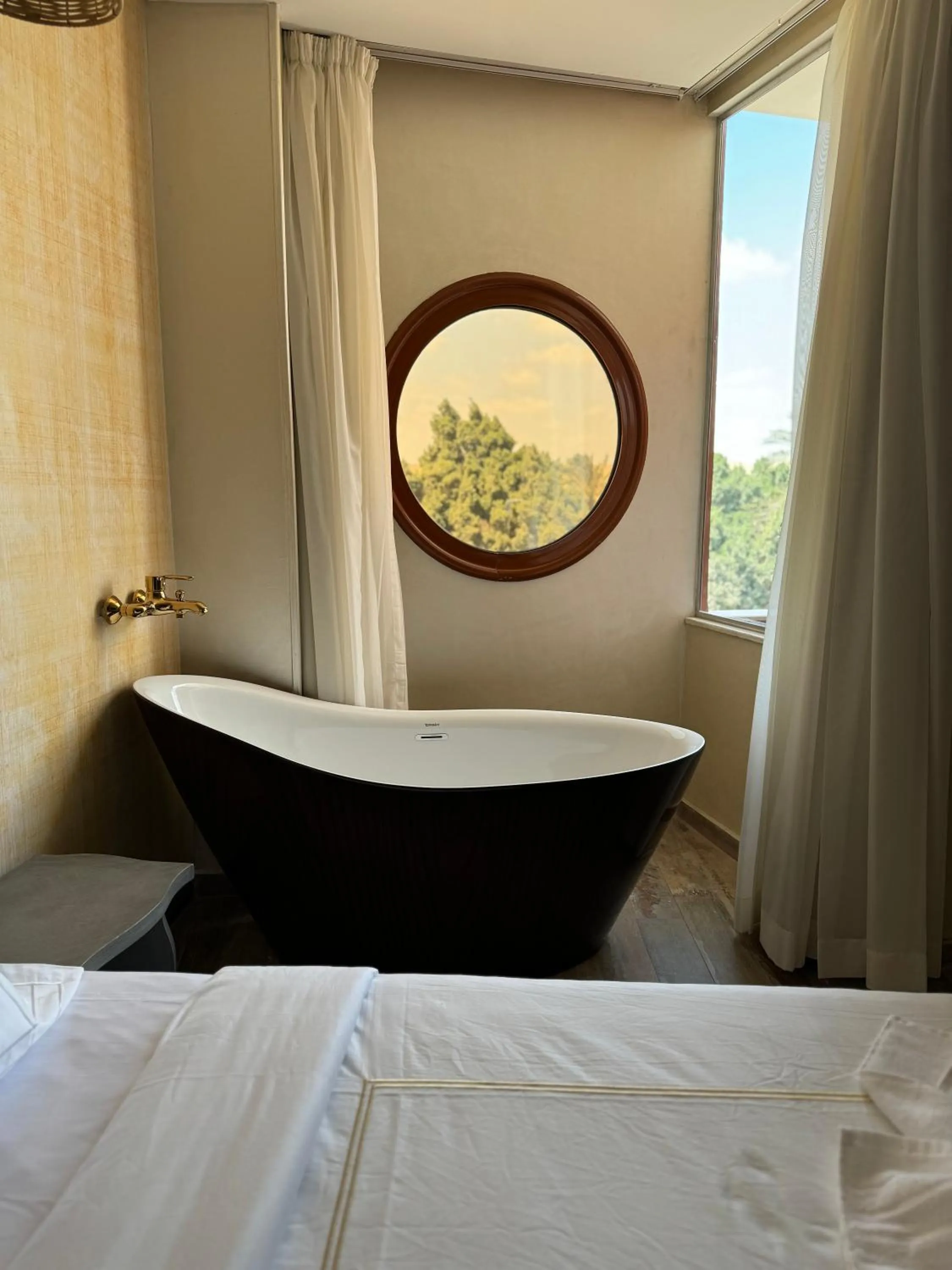 Bed in Almas Pyramids Hotel