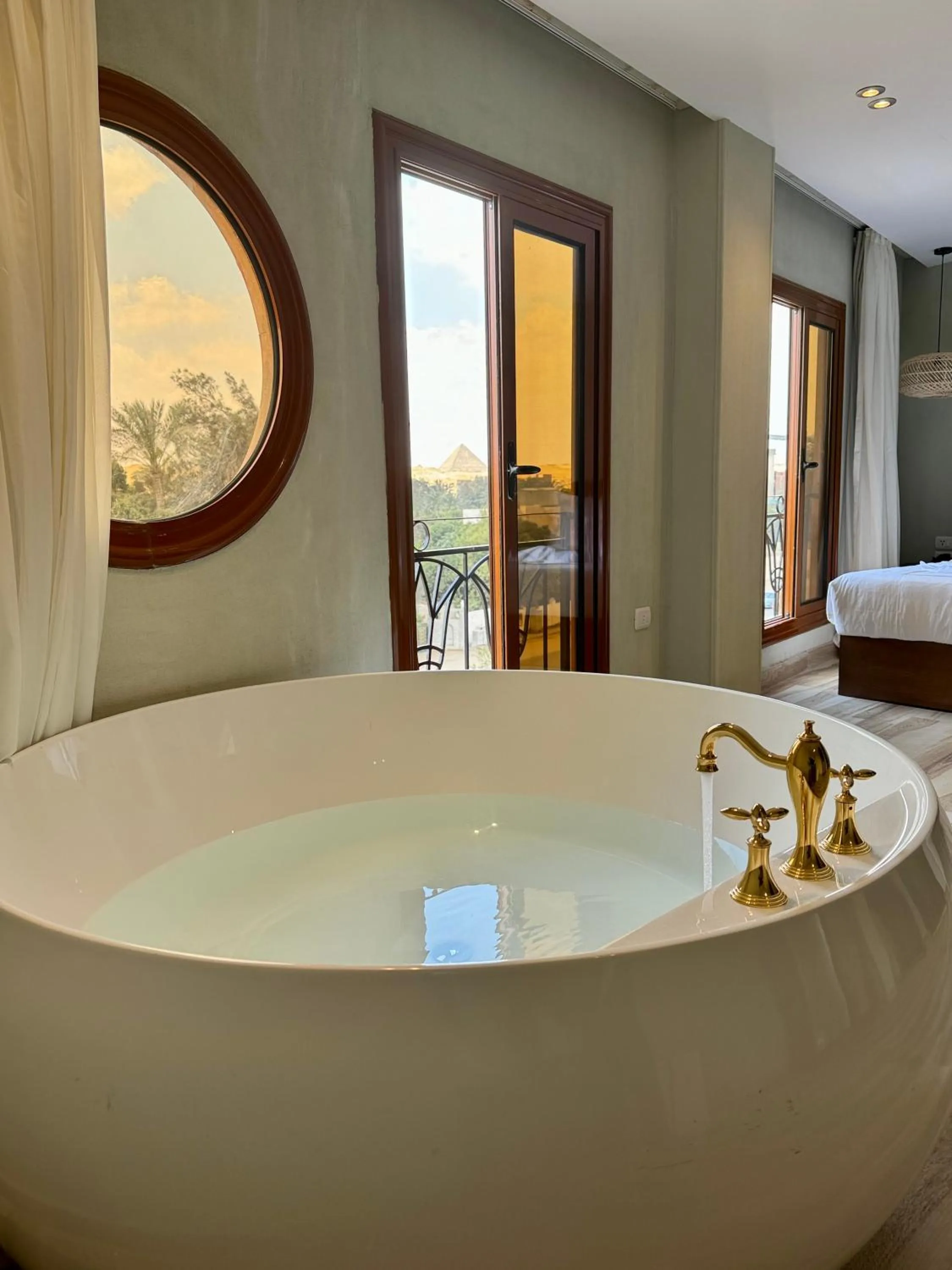 Bed in Almas Pyramids Hotel