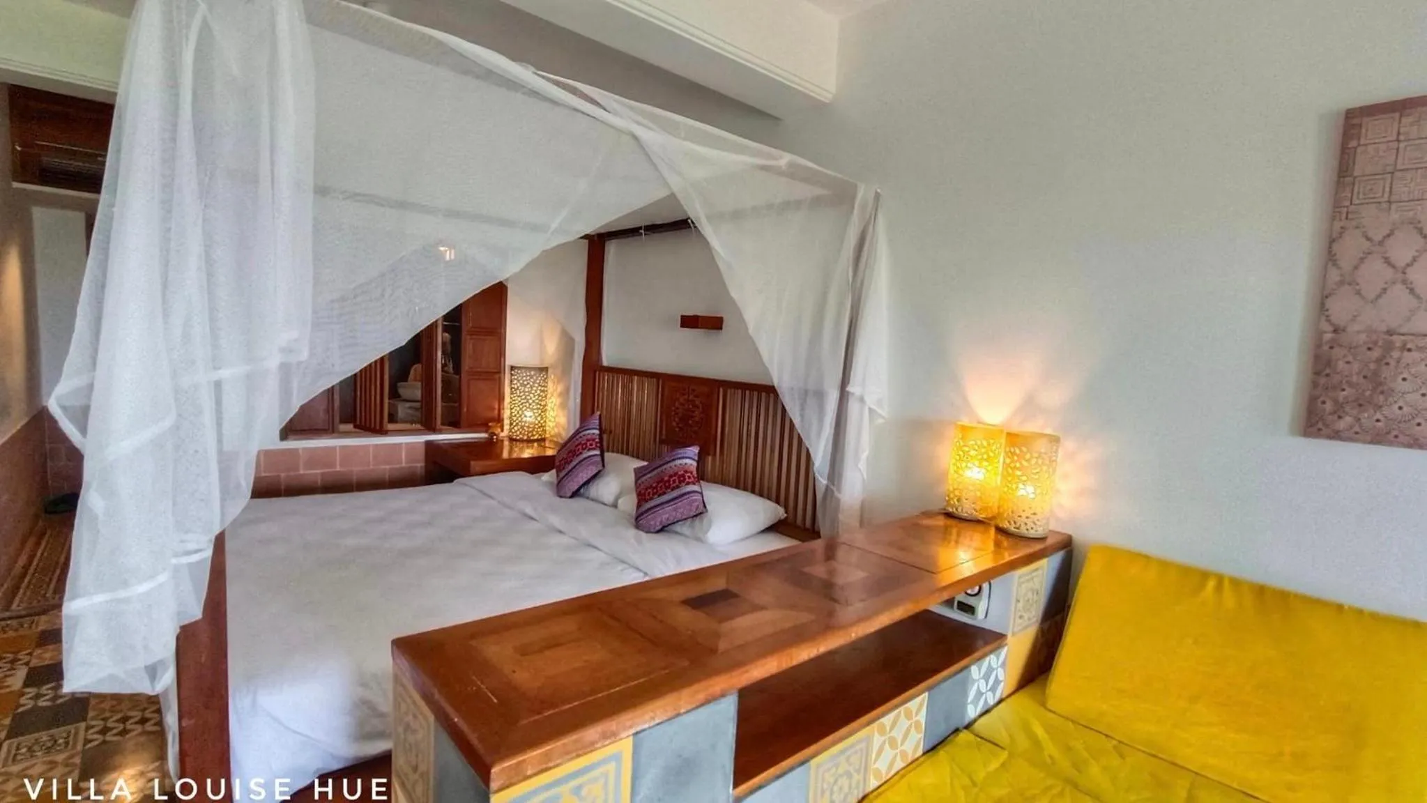 Bed in Villa Louise Hue Beach Boutique Hotel