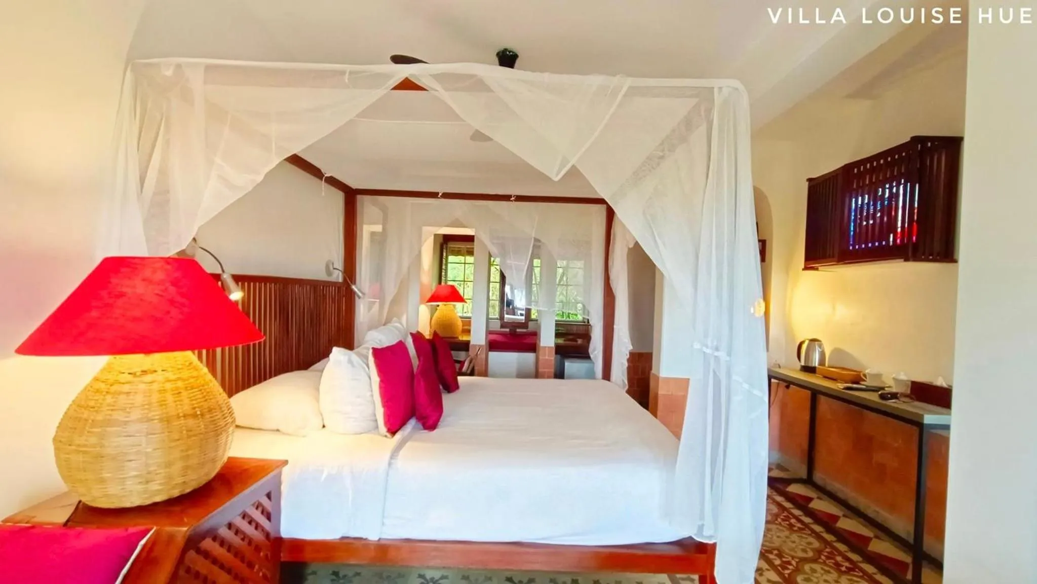 Photo of the whole room, Bed in Villa Louise Hue Beach Boutique Hotel