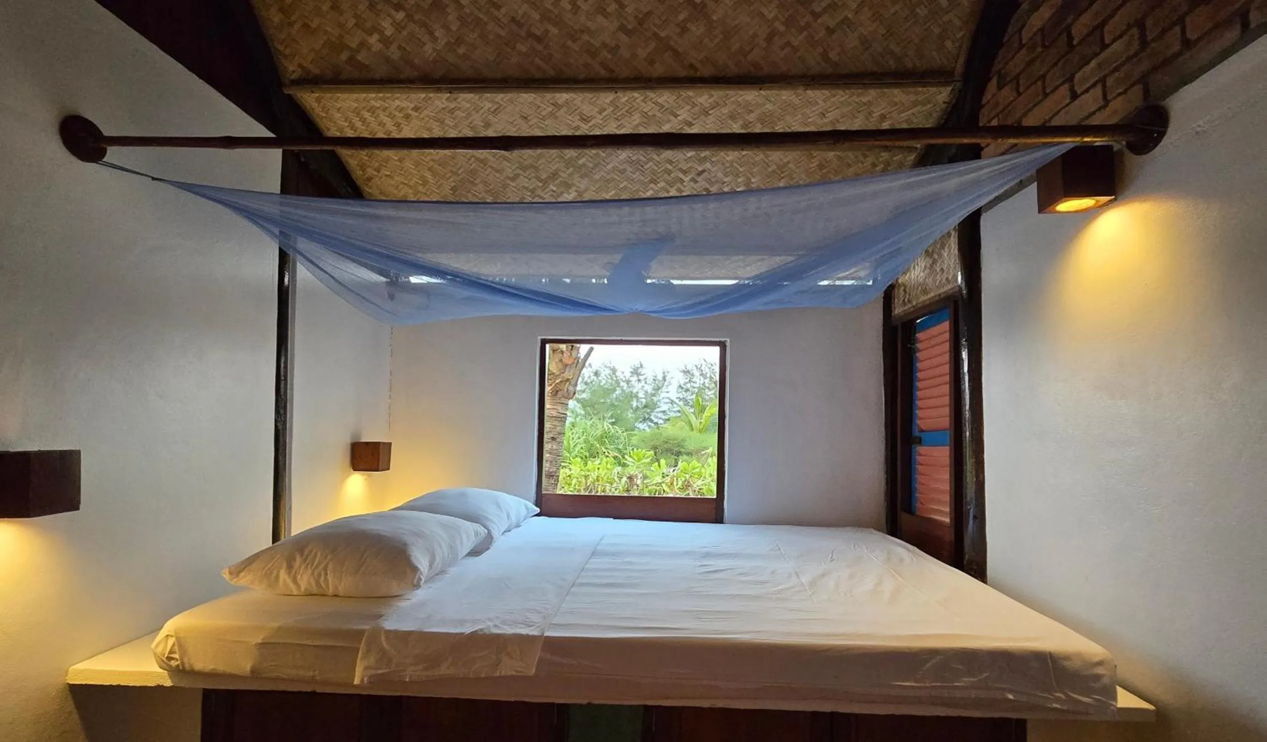 Bed in Villa Louise Hue Beach Boutique Hotel