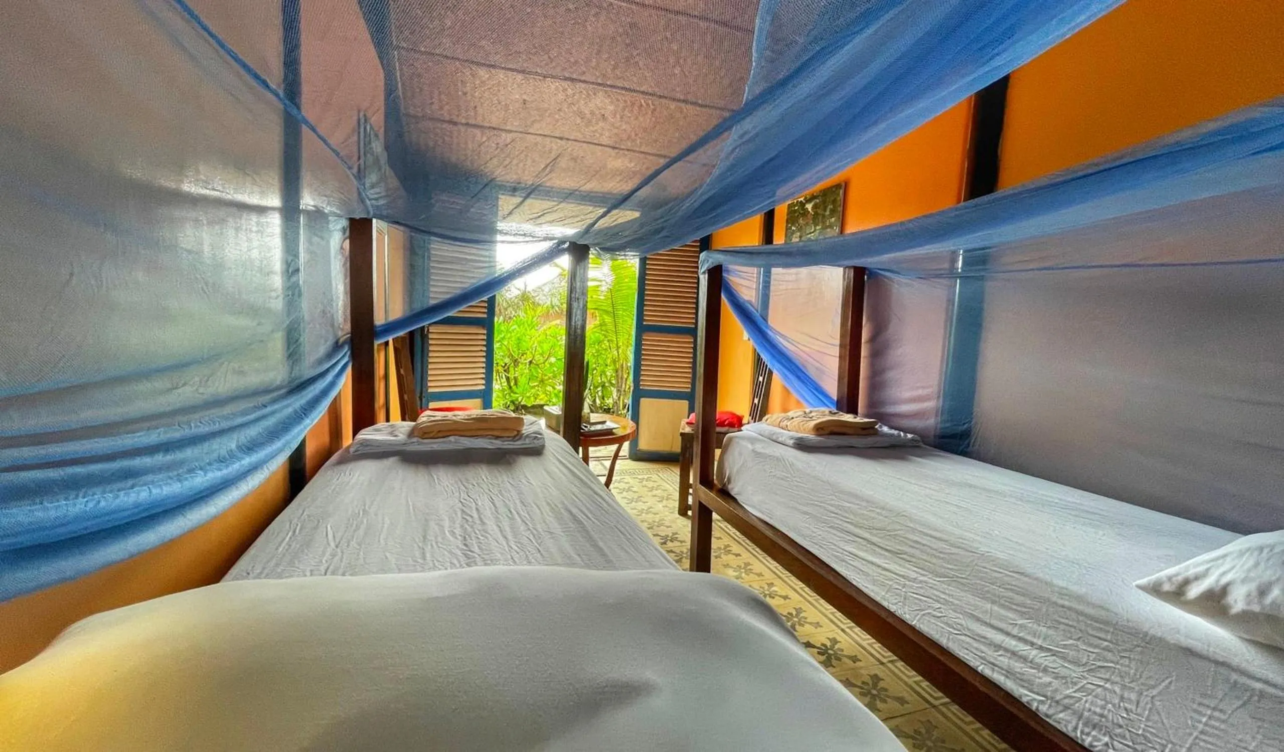 Bed in Villa Louise Hue Beach Boutique Hotel