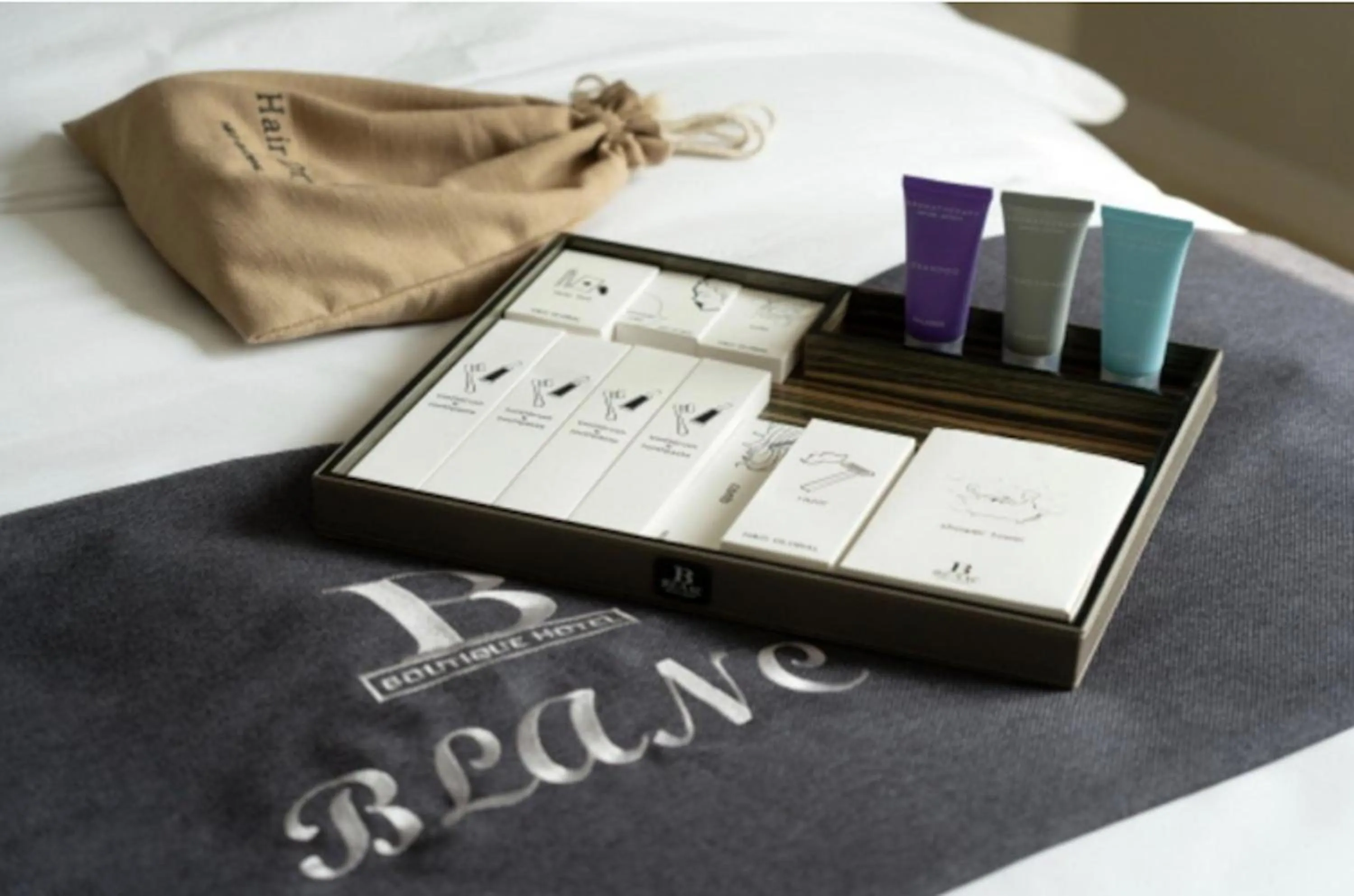 Bed in Blanc Hotel & Resort