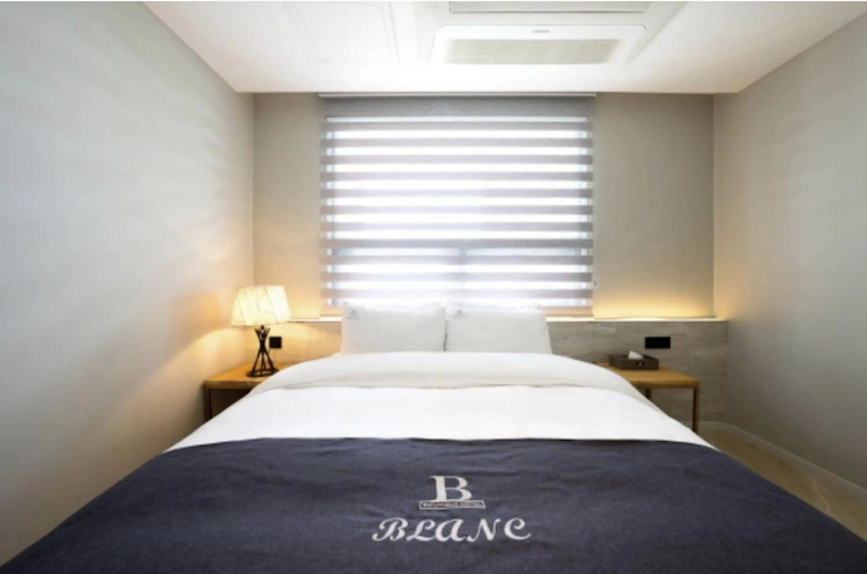 Bed in Blanc Hotel & Resort