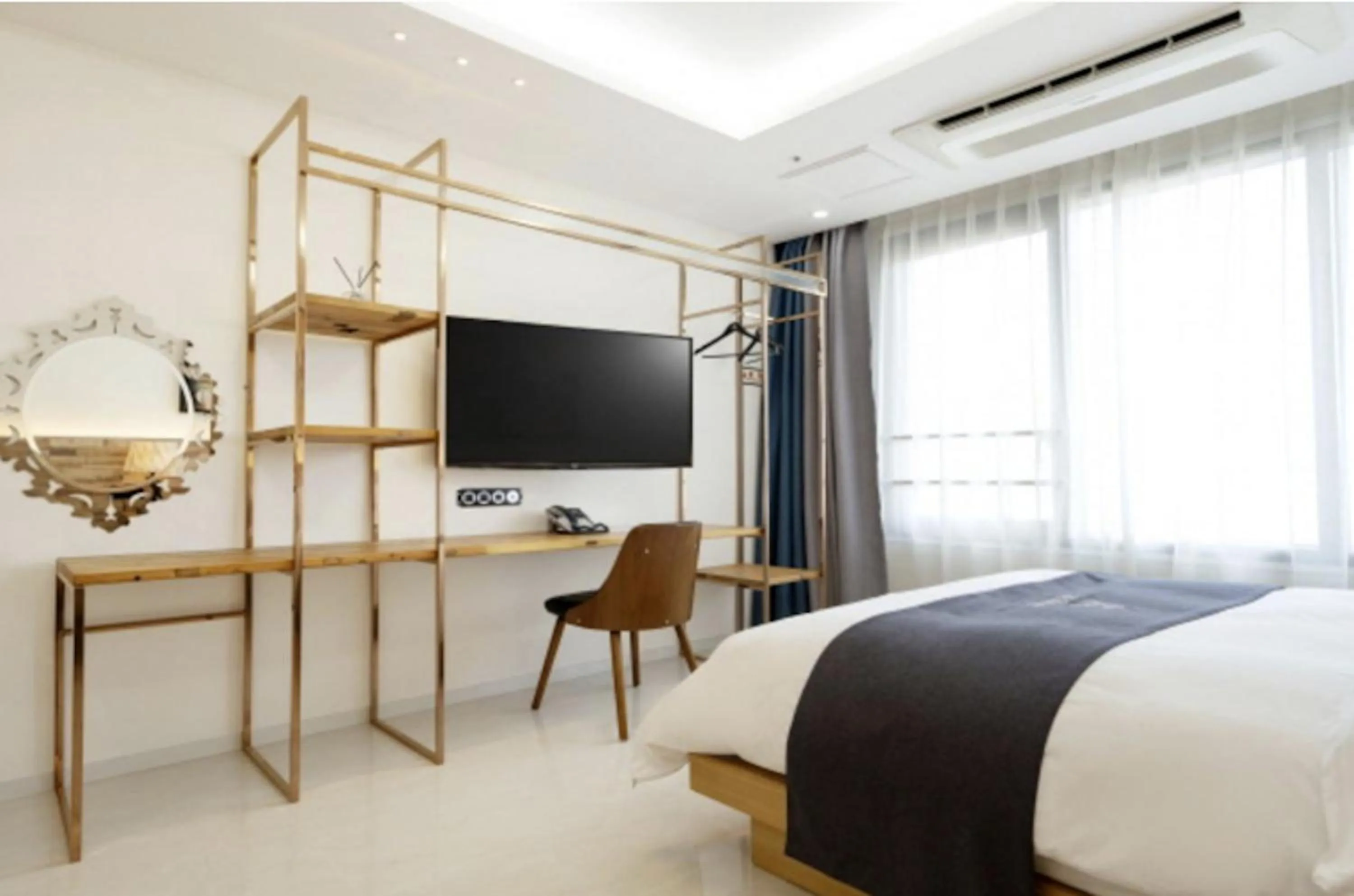 Bed in Blanc Hotel & Resort