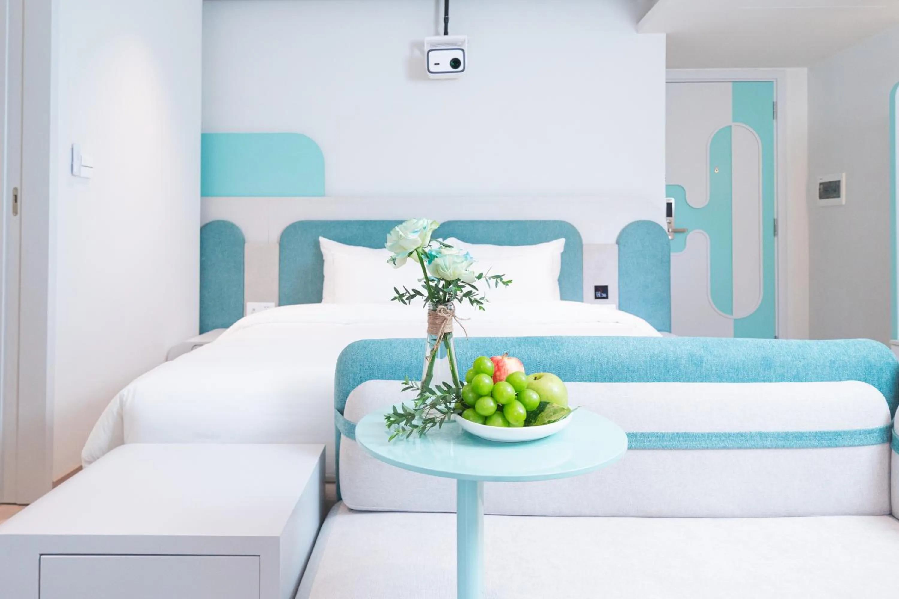 Bedroom, Bed in IconSphere Hotel