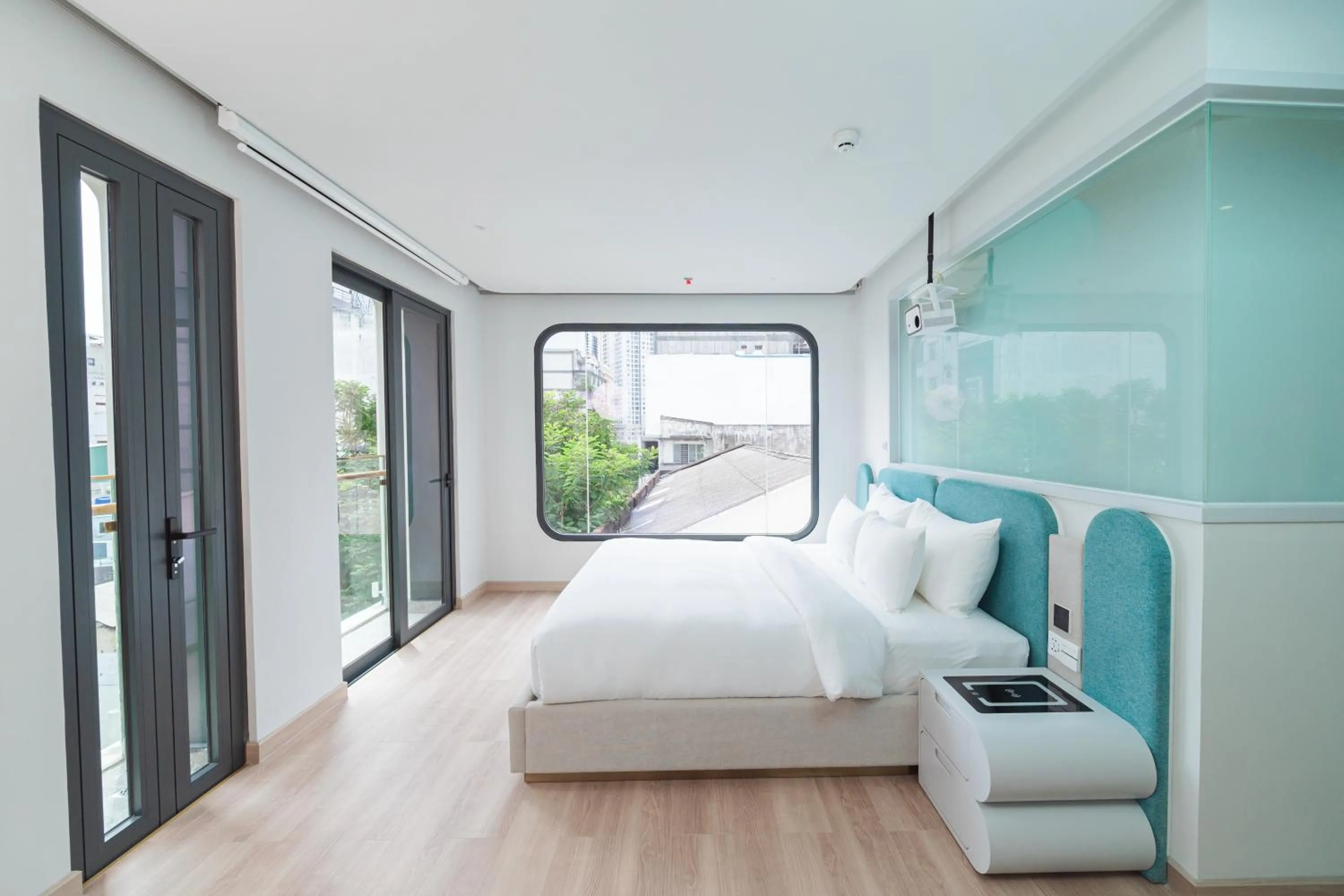 Bedroom, Bed in IconSphere Hotel