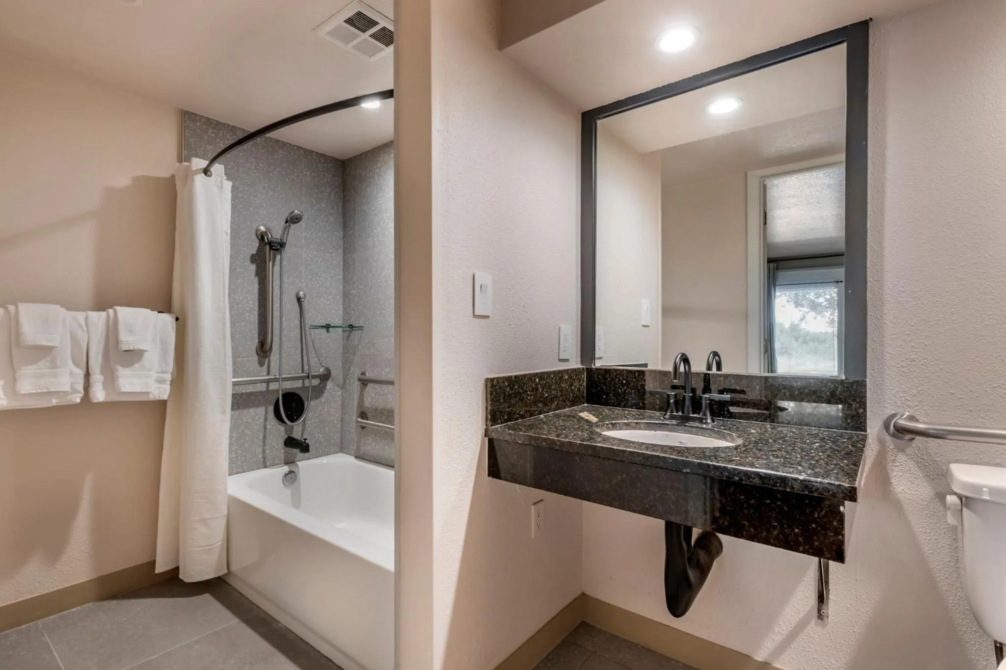 Bathroom in voco Kissimmee Orlando by IHG