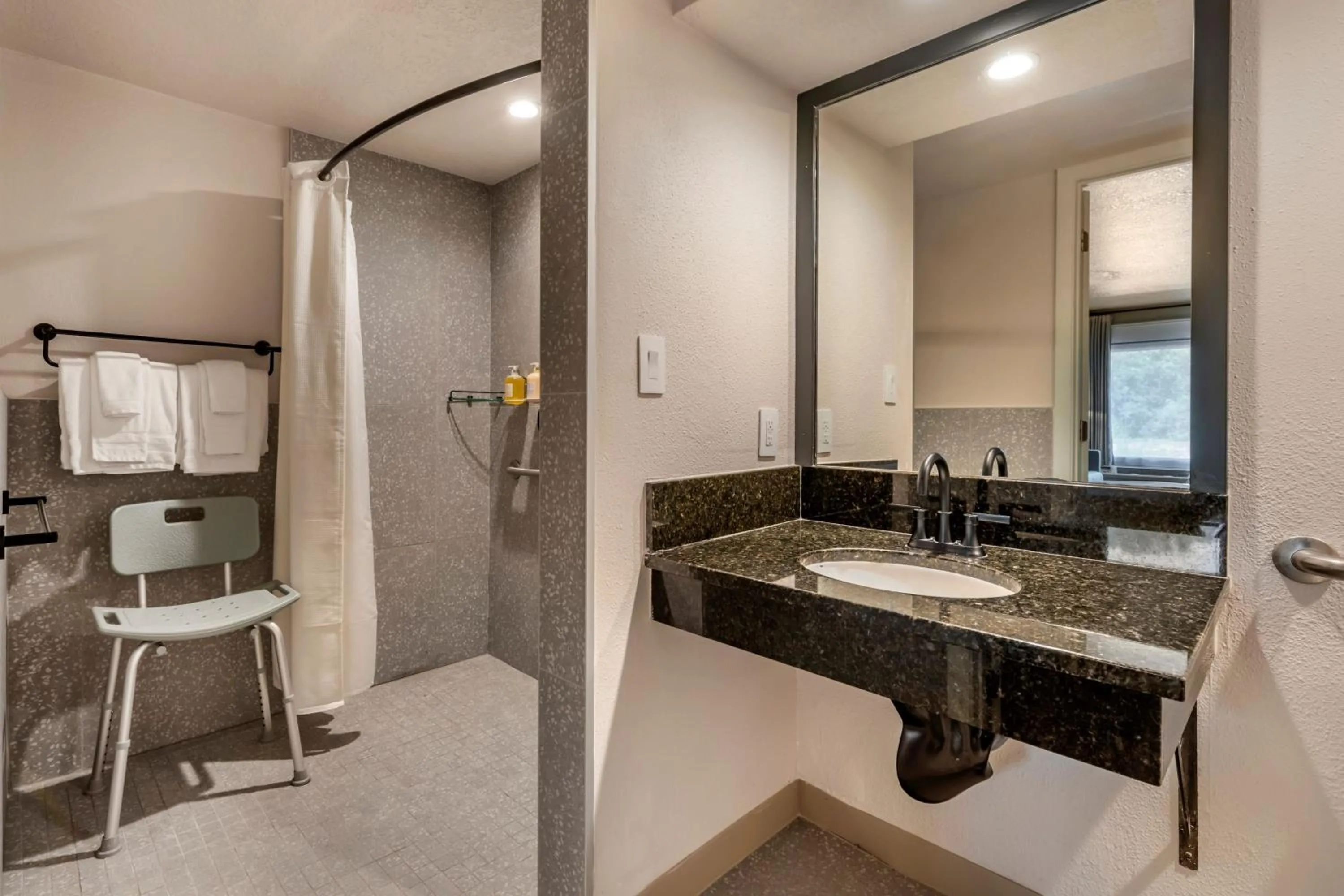 Bathroom in voco Kissimmee Orlando by IHG