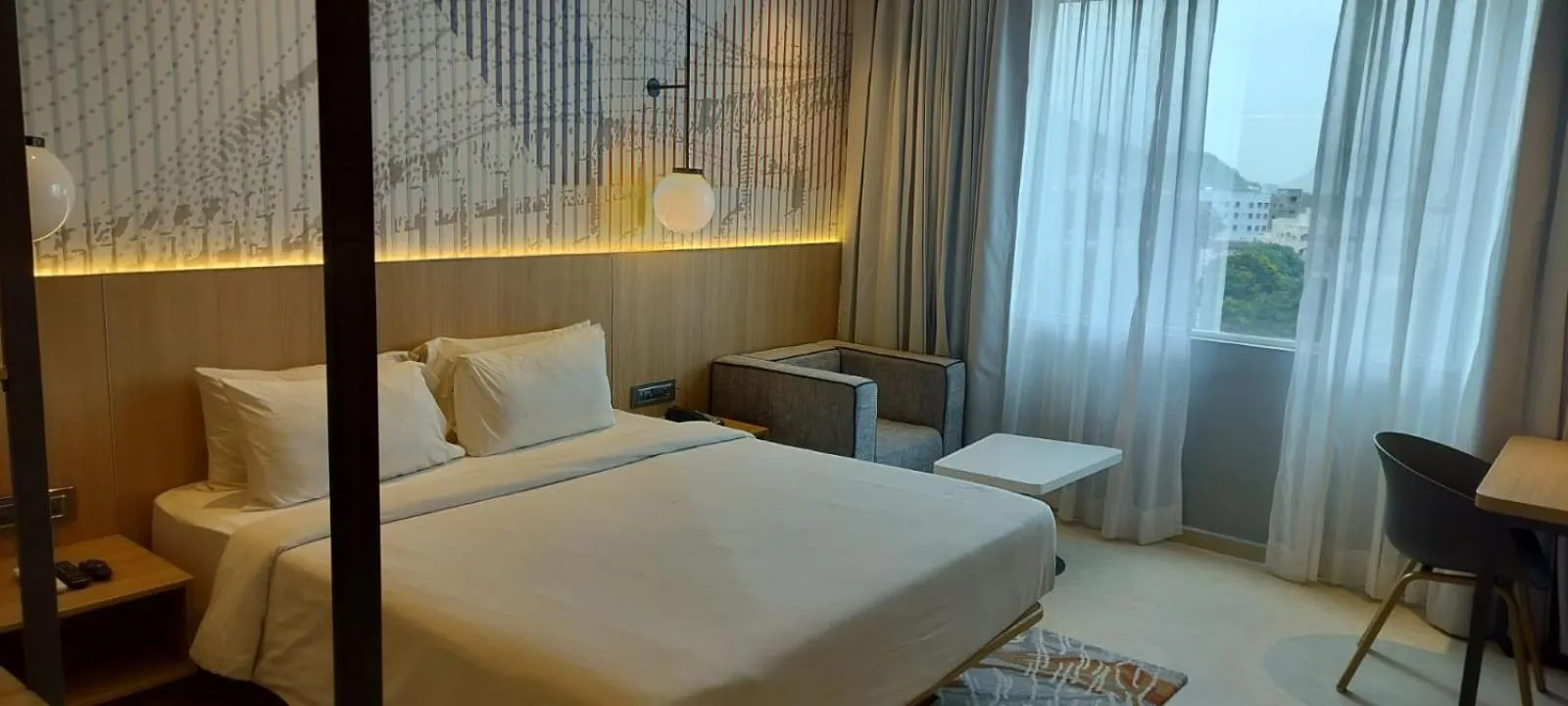 Bed in Hotel Manorama Vijayawada