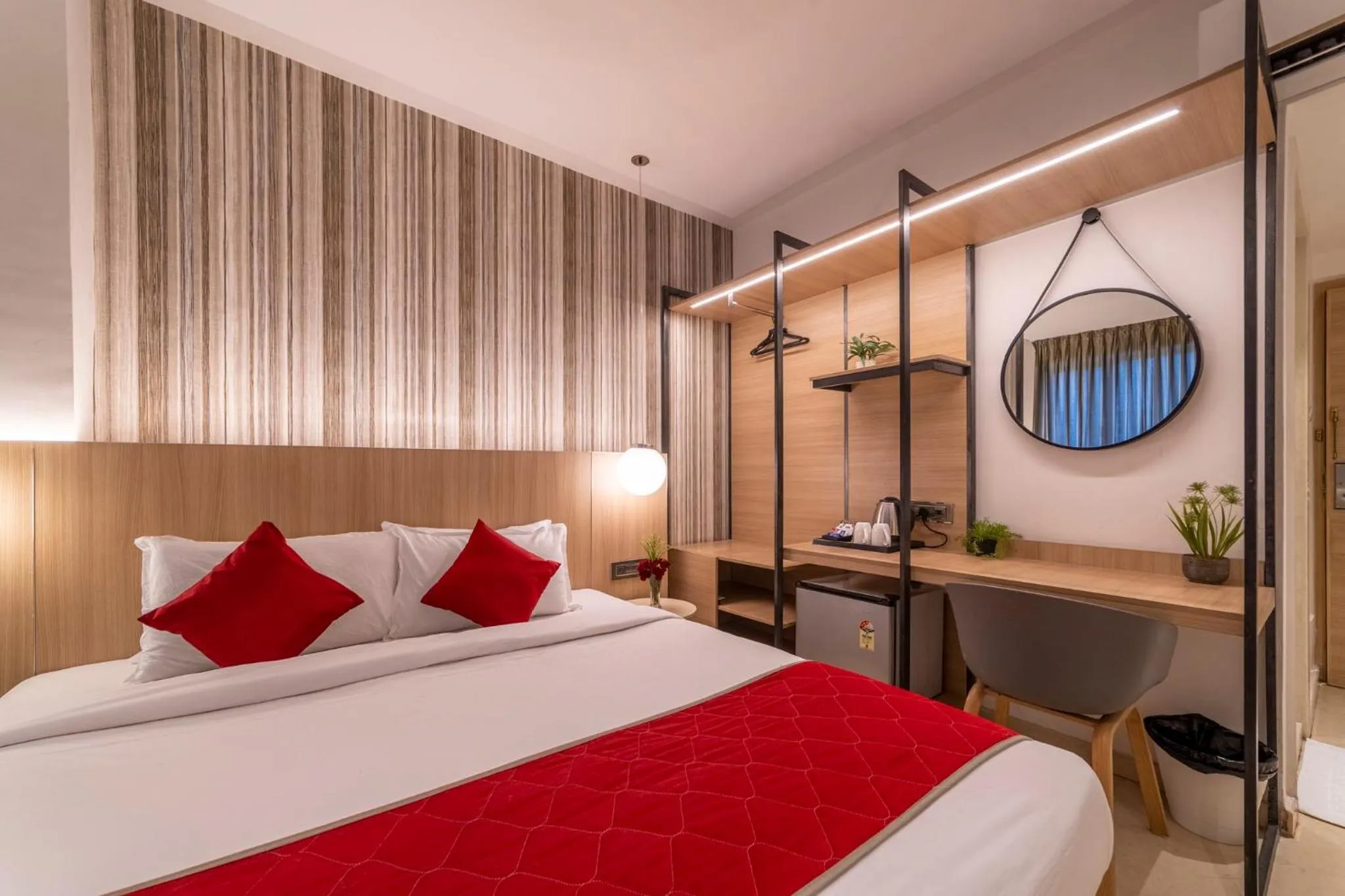 Photo of the whole room, Bed in Hotel Manorama Vijayawada