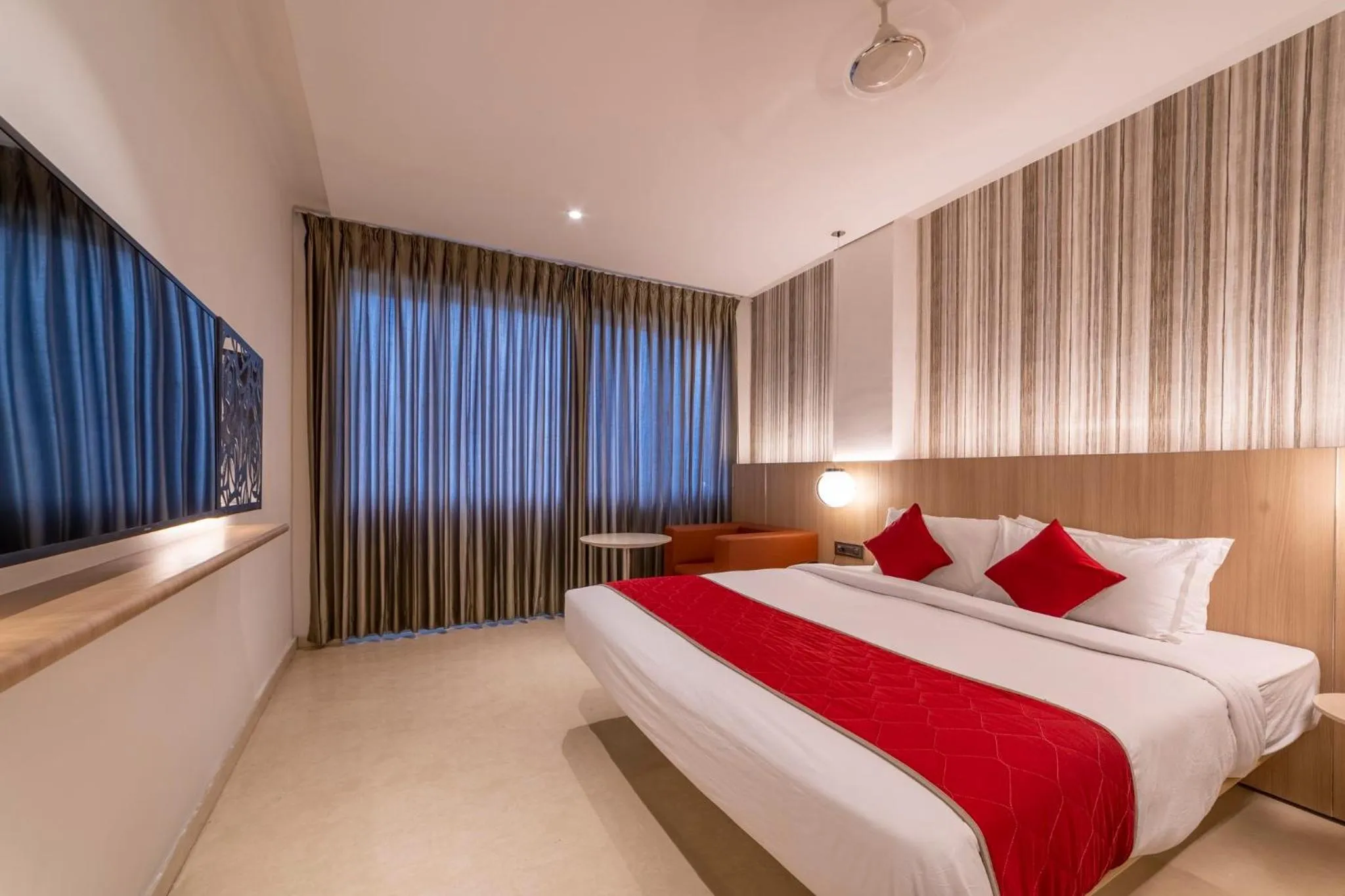 Photo of the whole room, Bed in Hotel Manorama Vijayawada