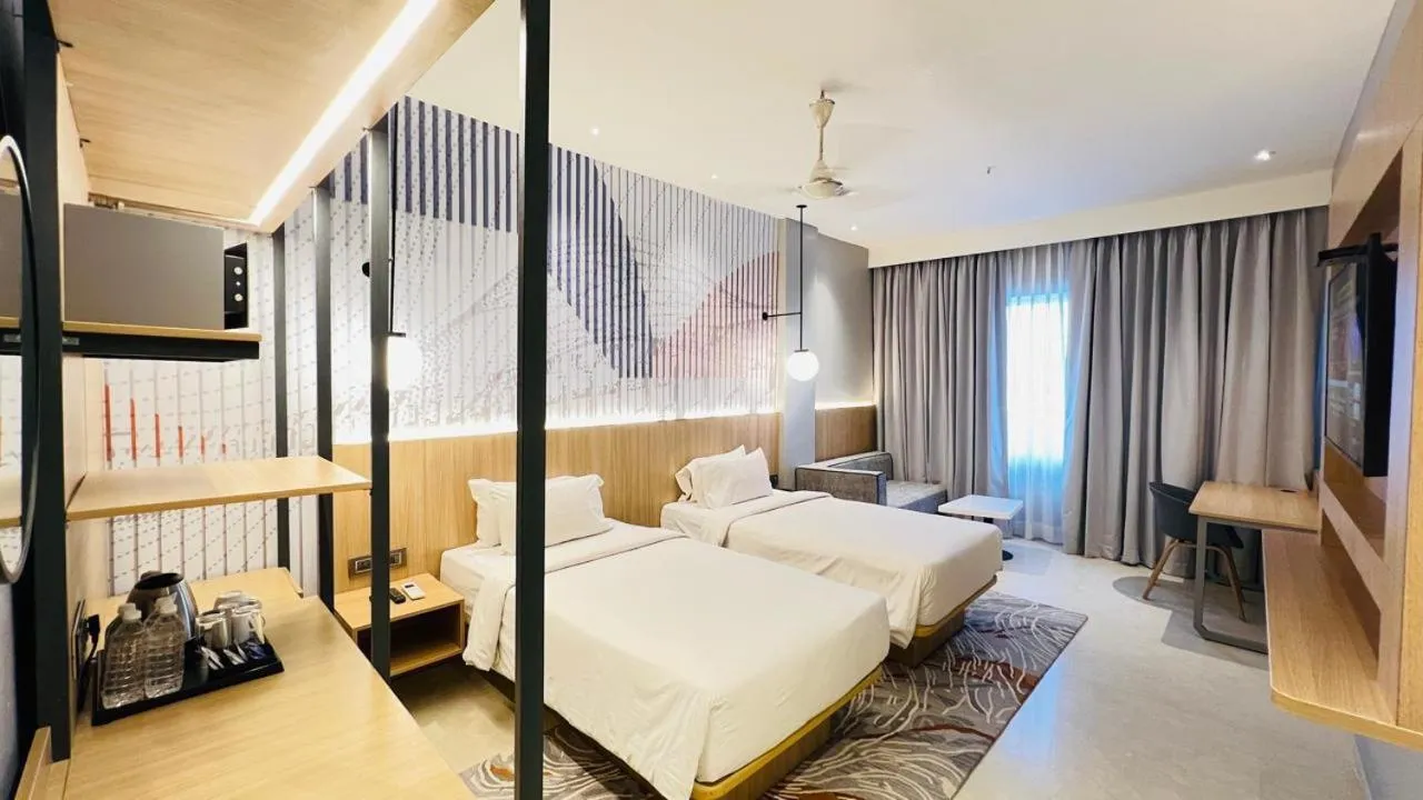 Bed in Hotel Manorama Vijayawada