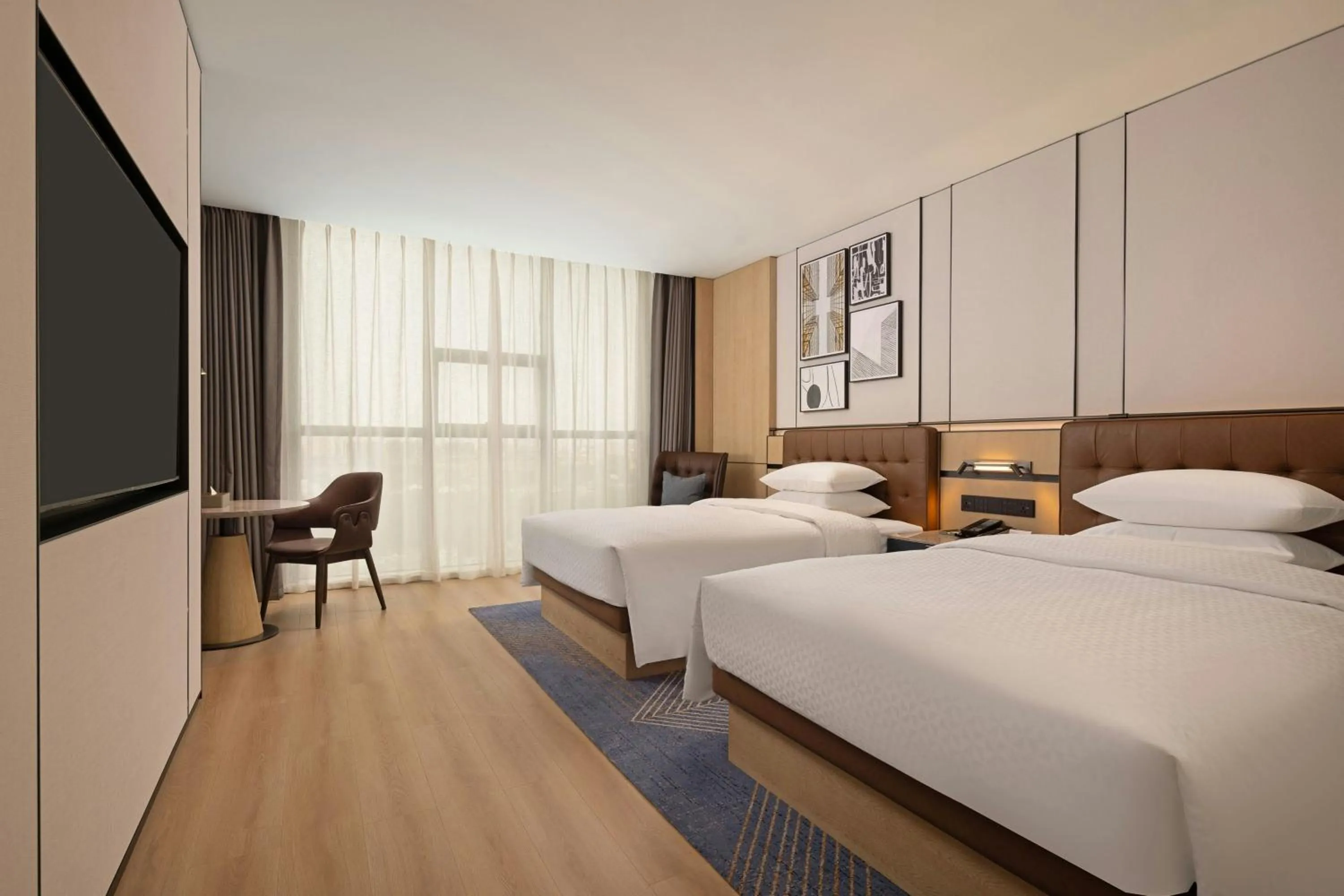 Photo of the whole room, Bed in Four Points by Sheraton Mianyang