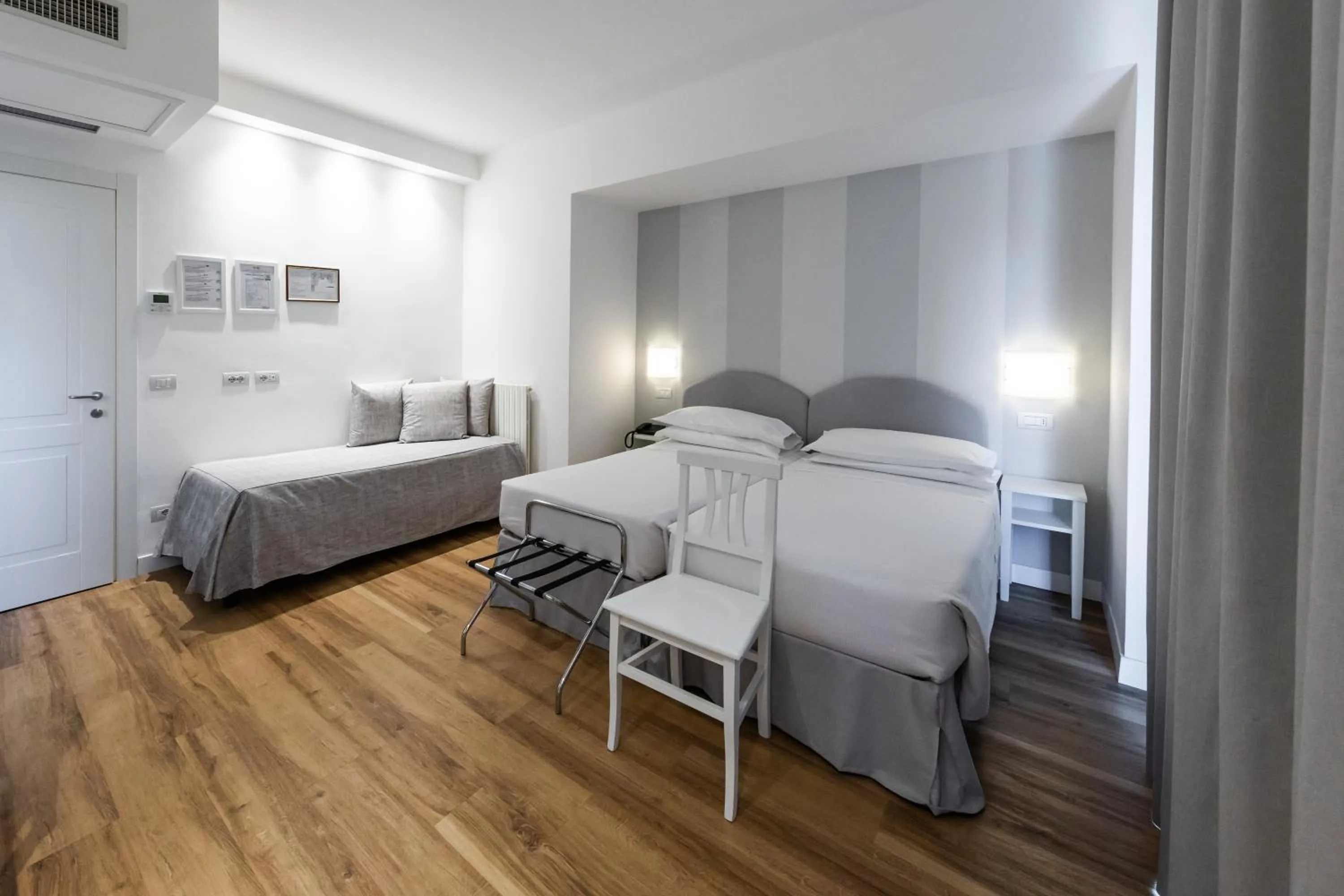 Bed in Hotel Beau Rivage