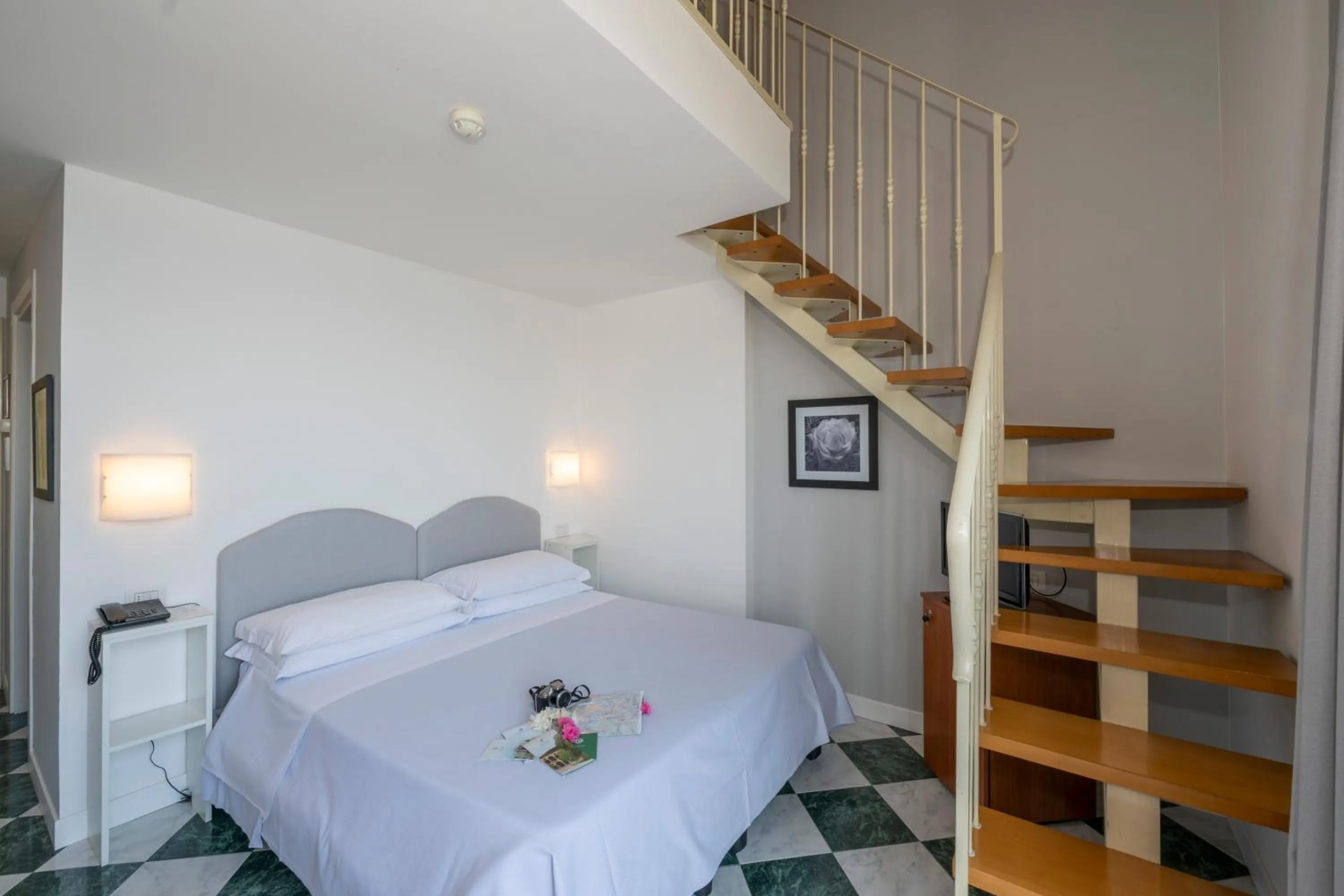 Bed in Hotel Beau Rivage