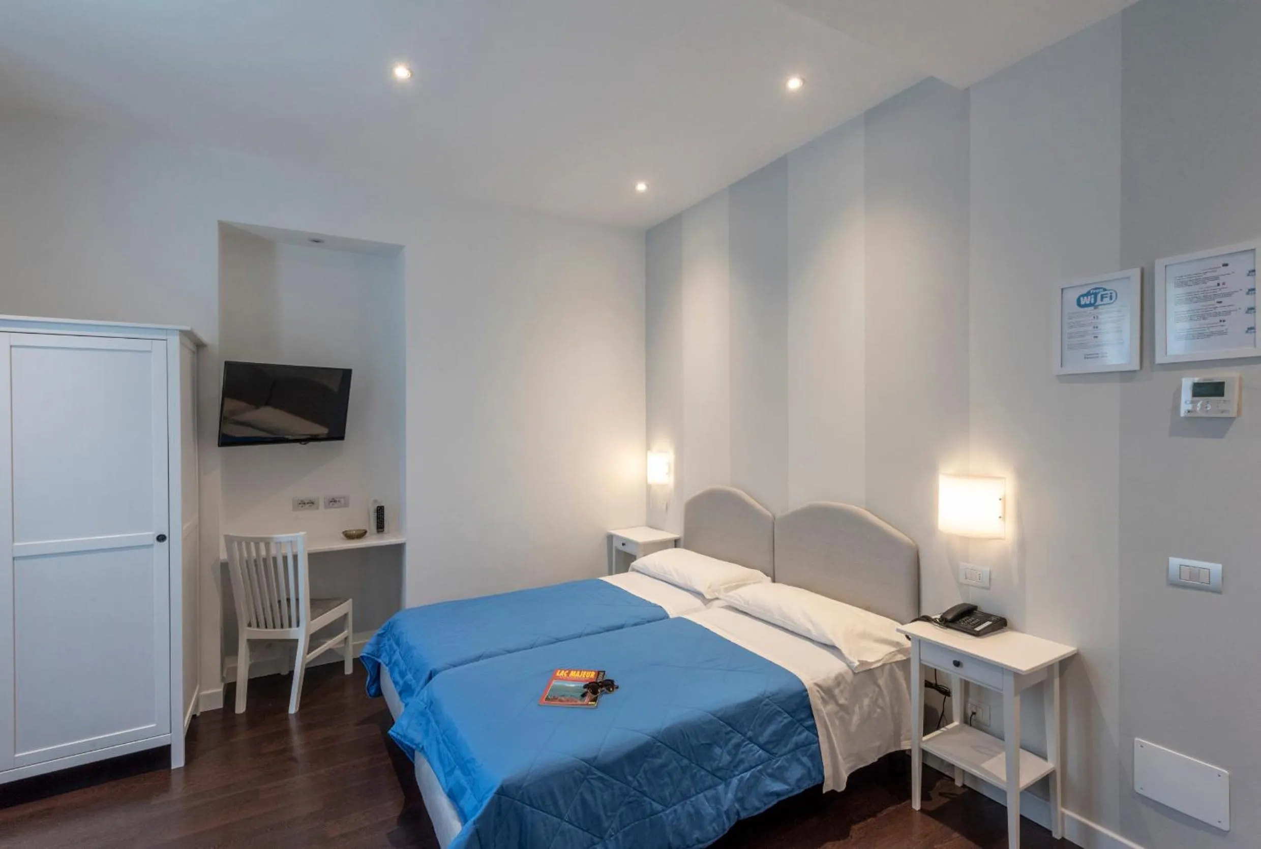 Bed in Hotel Beau Rivage