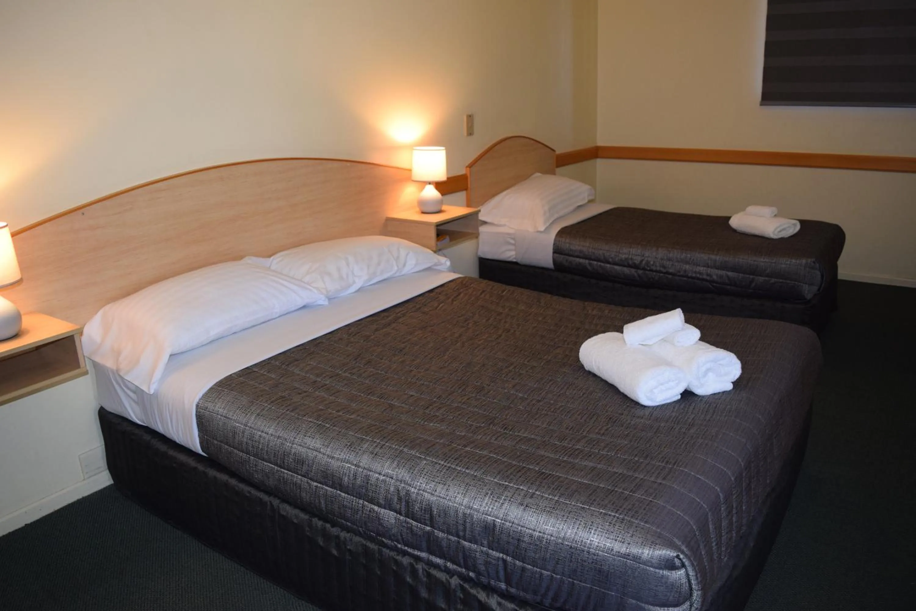 Bed in Warwick Vines Motel