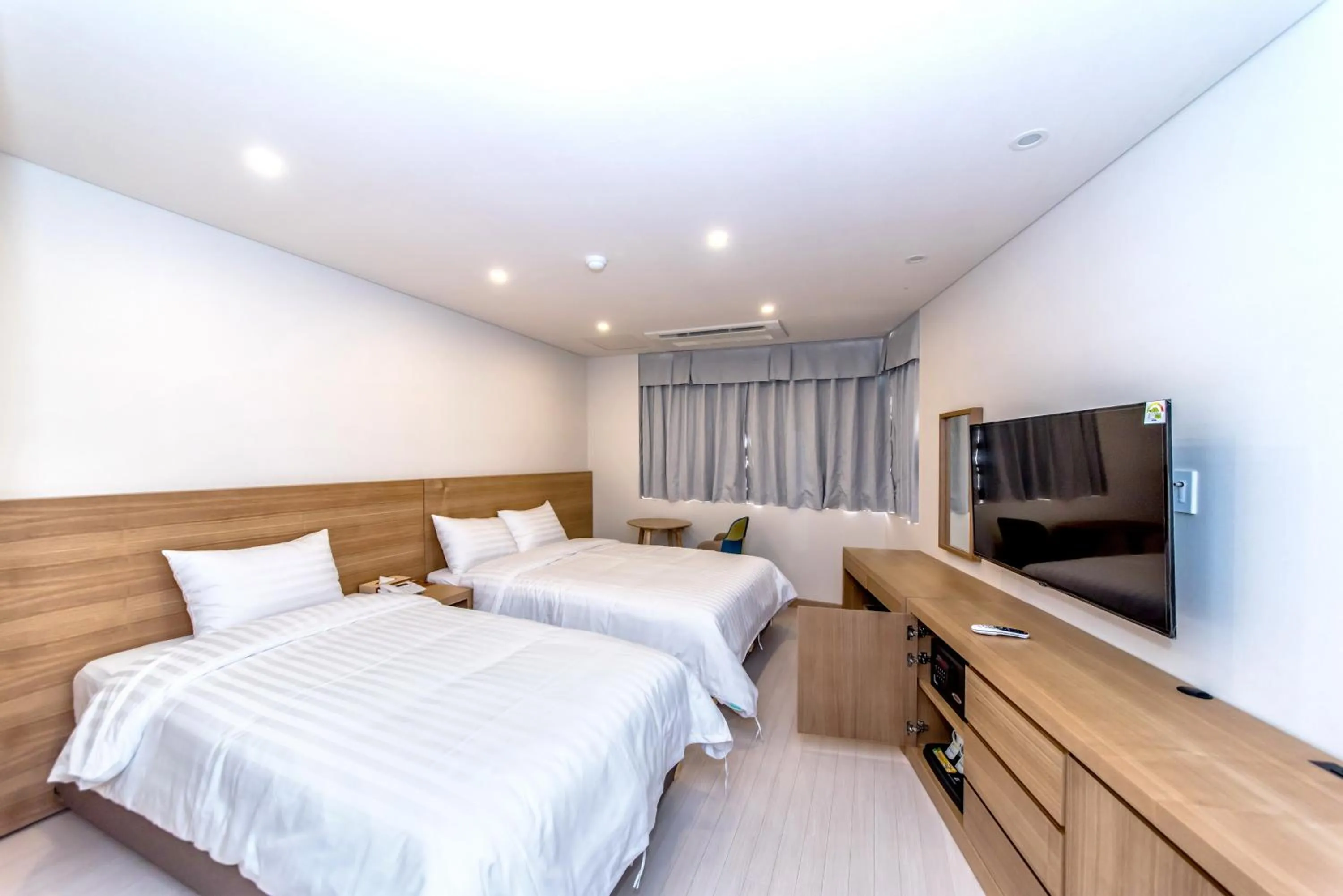 Photo of the whole room, Bed in BK Hotel Jeju