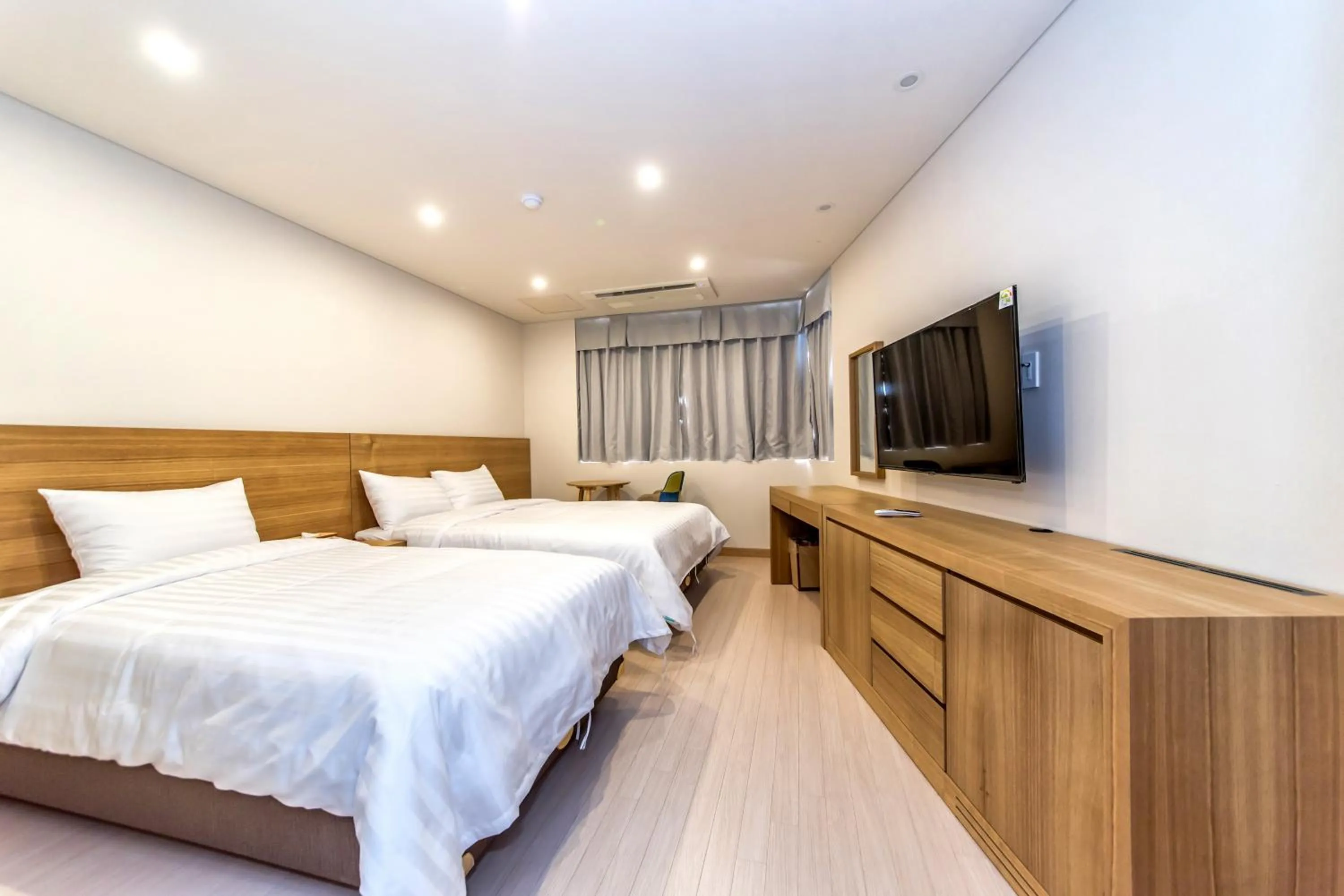 Photo of the whole room, Bed in BK Hotel Jeju