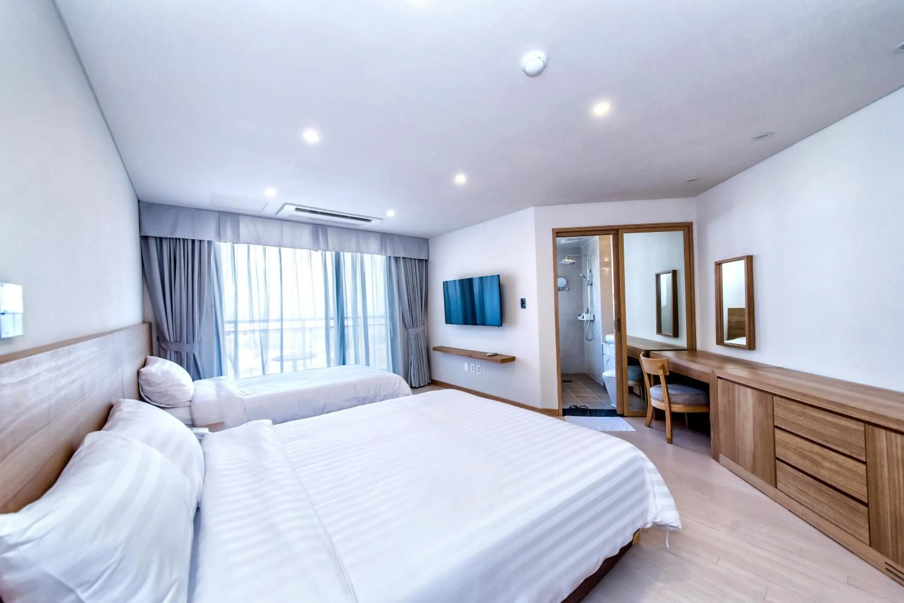 Photo of the whole room, Bed in BK Hotel Jeju