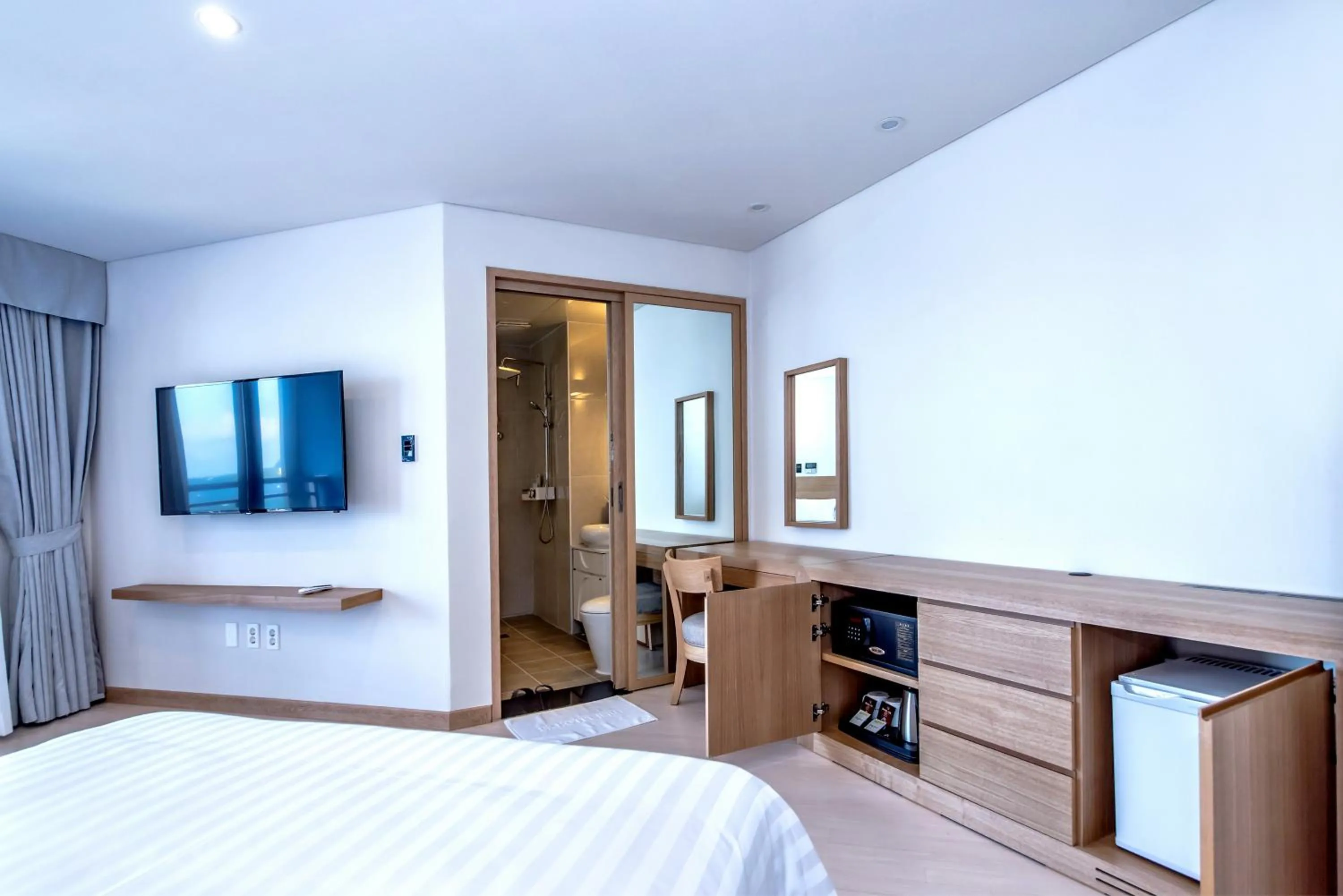 Photo of the whole room, Bed in BK Hotel Jeju