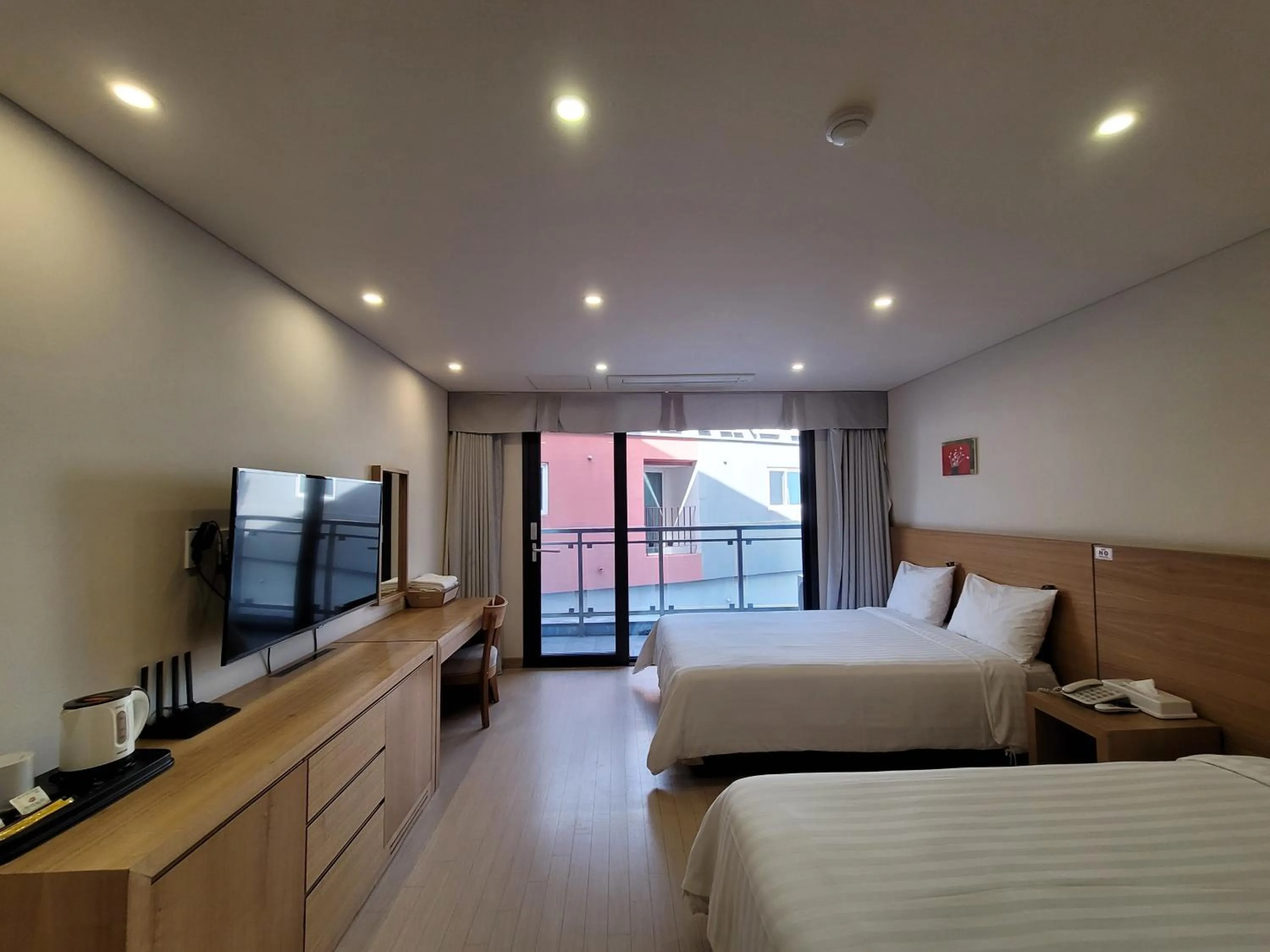 Photo of the whole room, Bed in BK Hotel Jeju