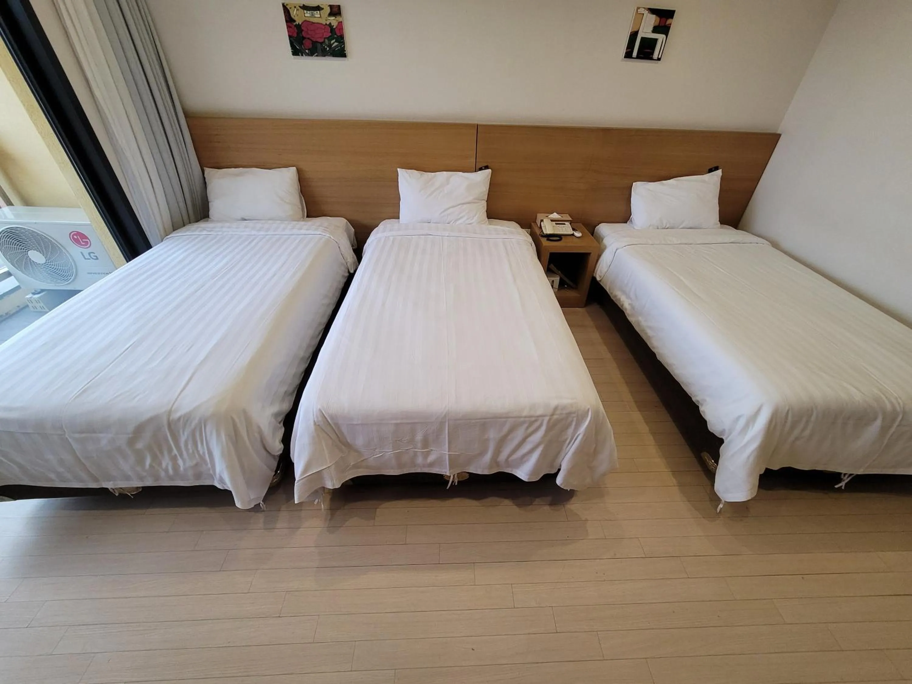 Bed in BK Hotel Jeju
