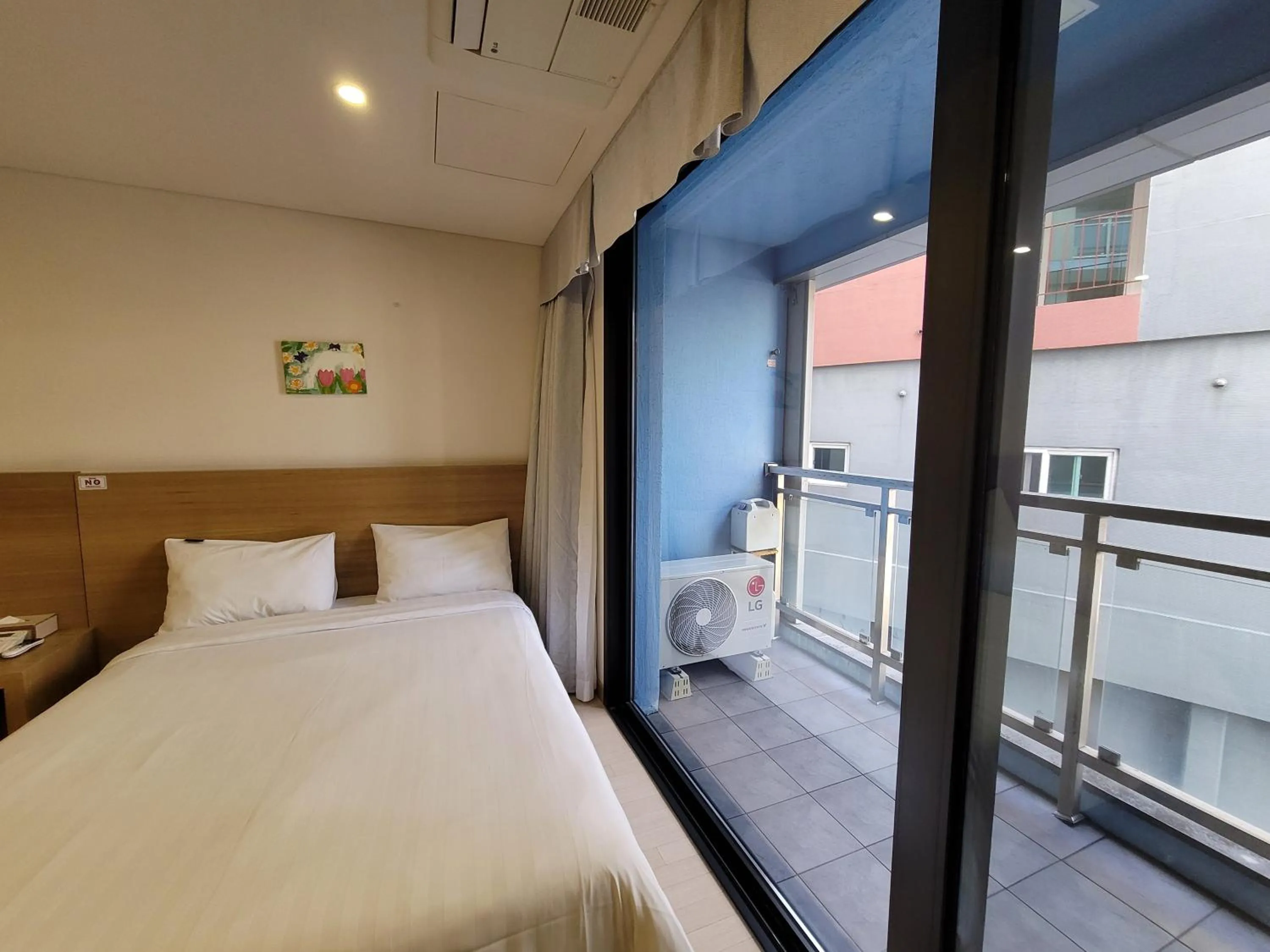 View (from property/room), Bed in BK Hotel Jeju