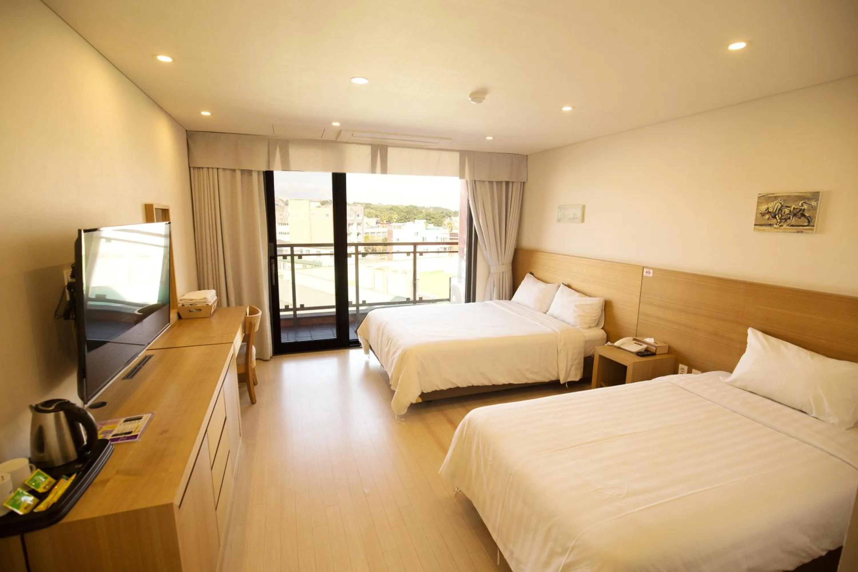 Photo of the whole room, Bed in BK Hotel Jeju