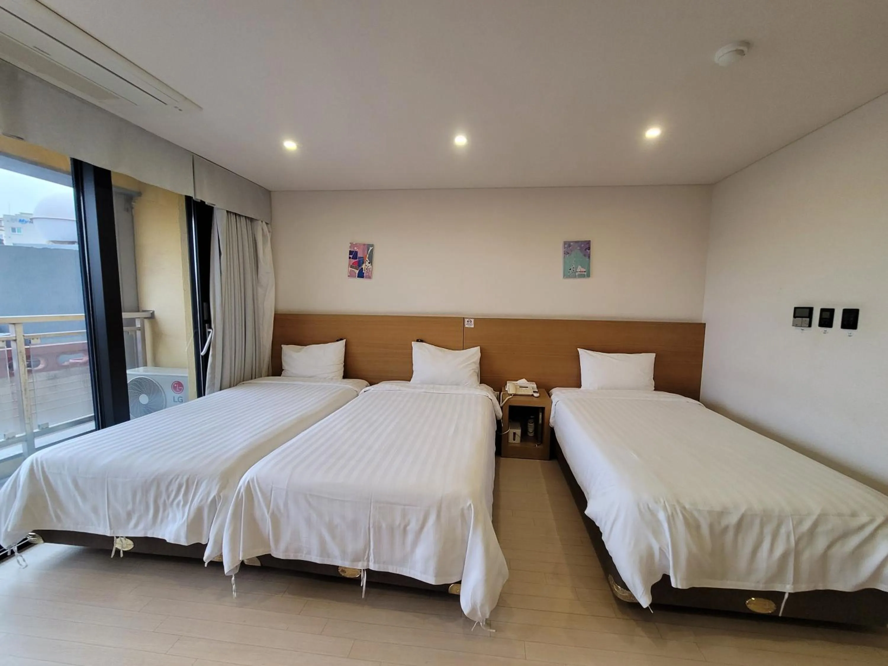 Bed in BK Hotel Jeju