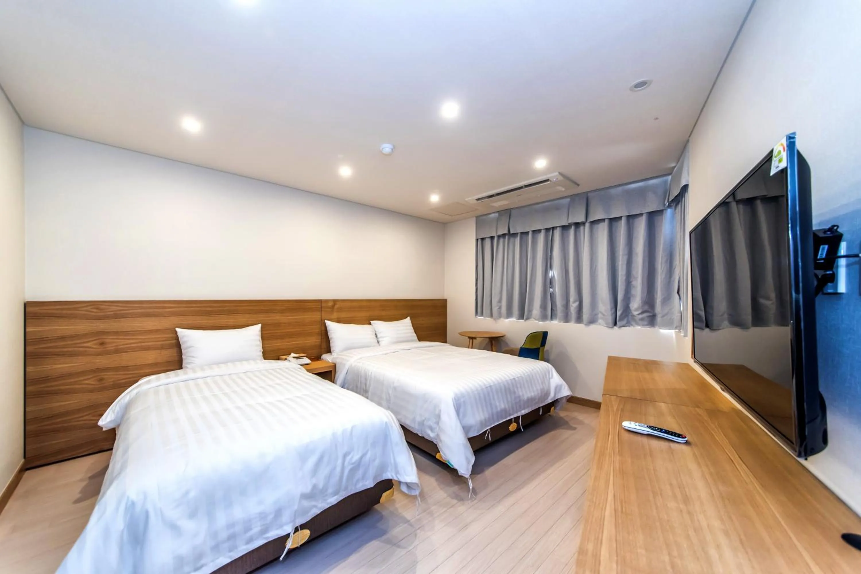 Bed in BK Hotel Jeju