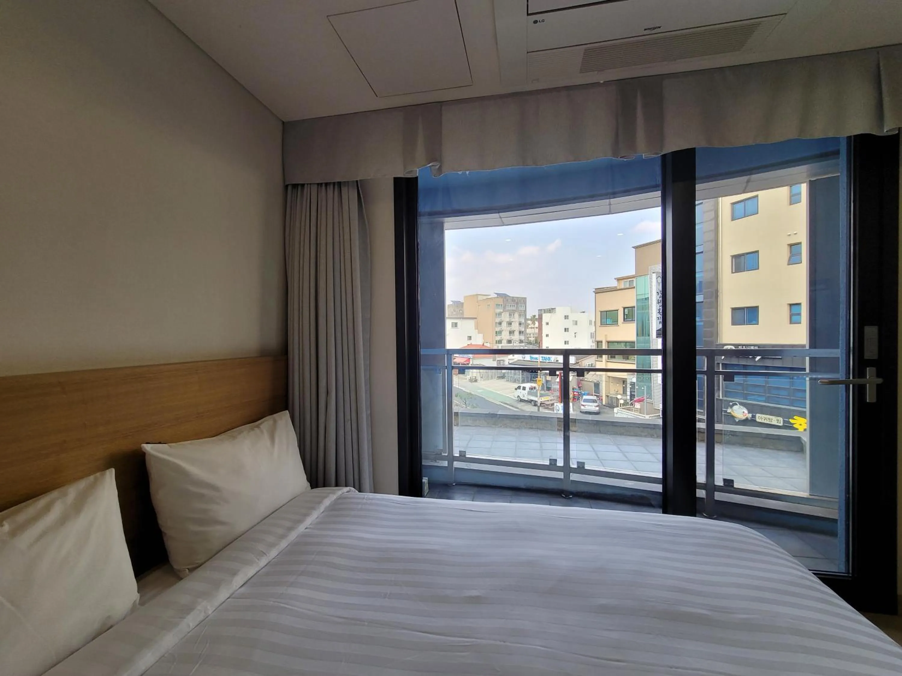 City view, Bed in BK Hotel Jeju