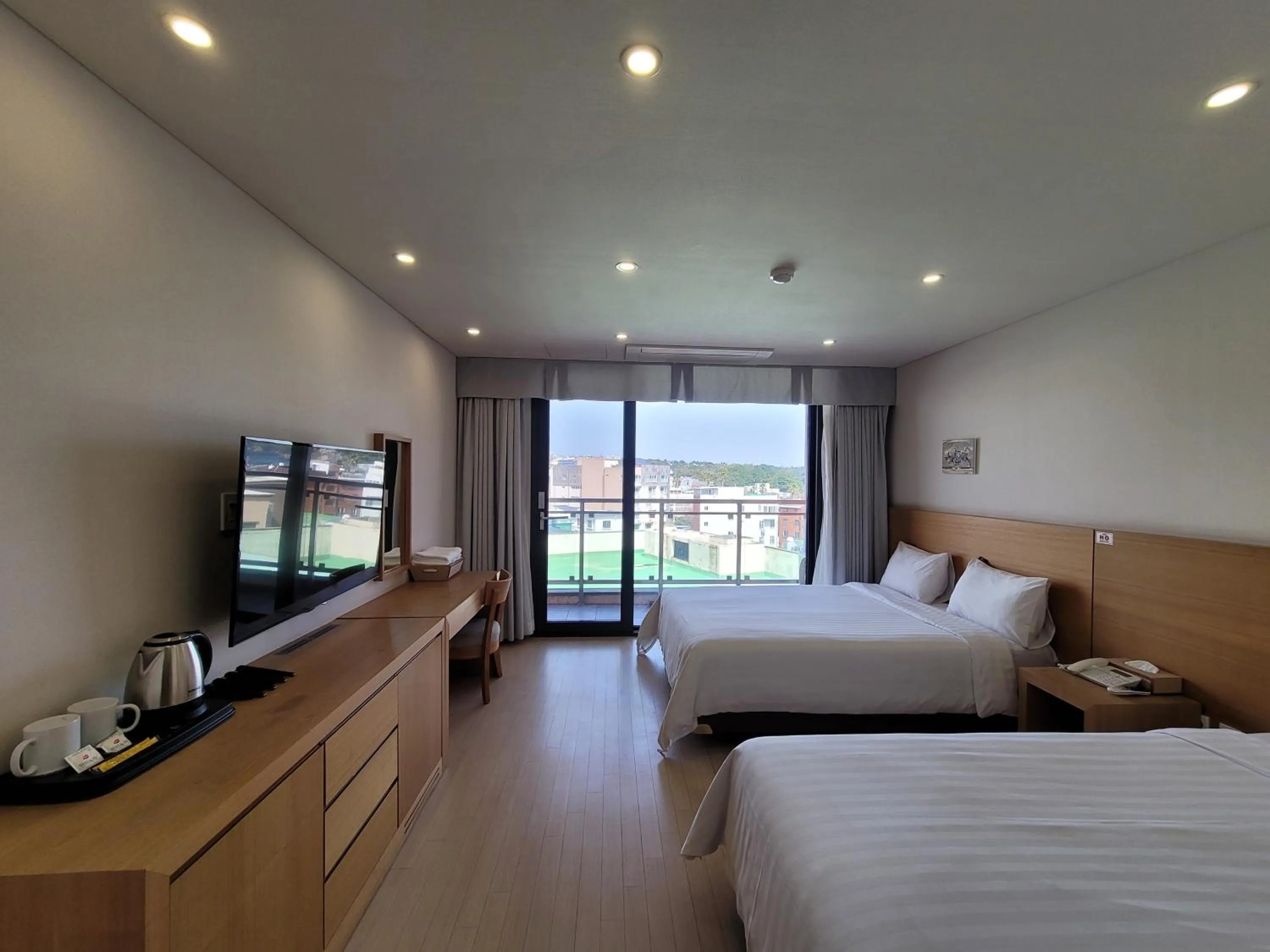 Photo of the whole room, Bed in BK Hotel Jeju
