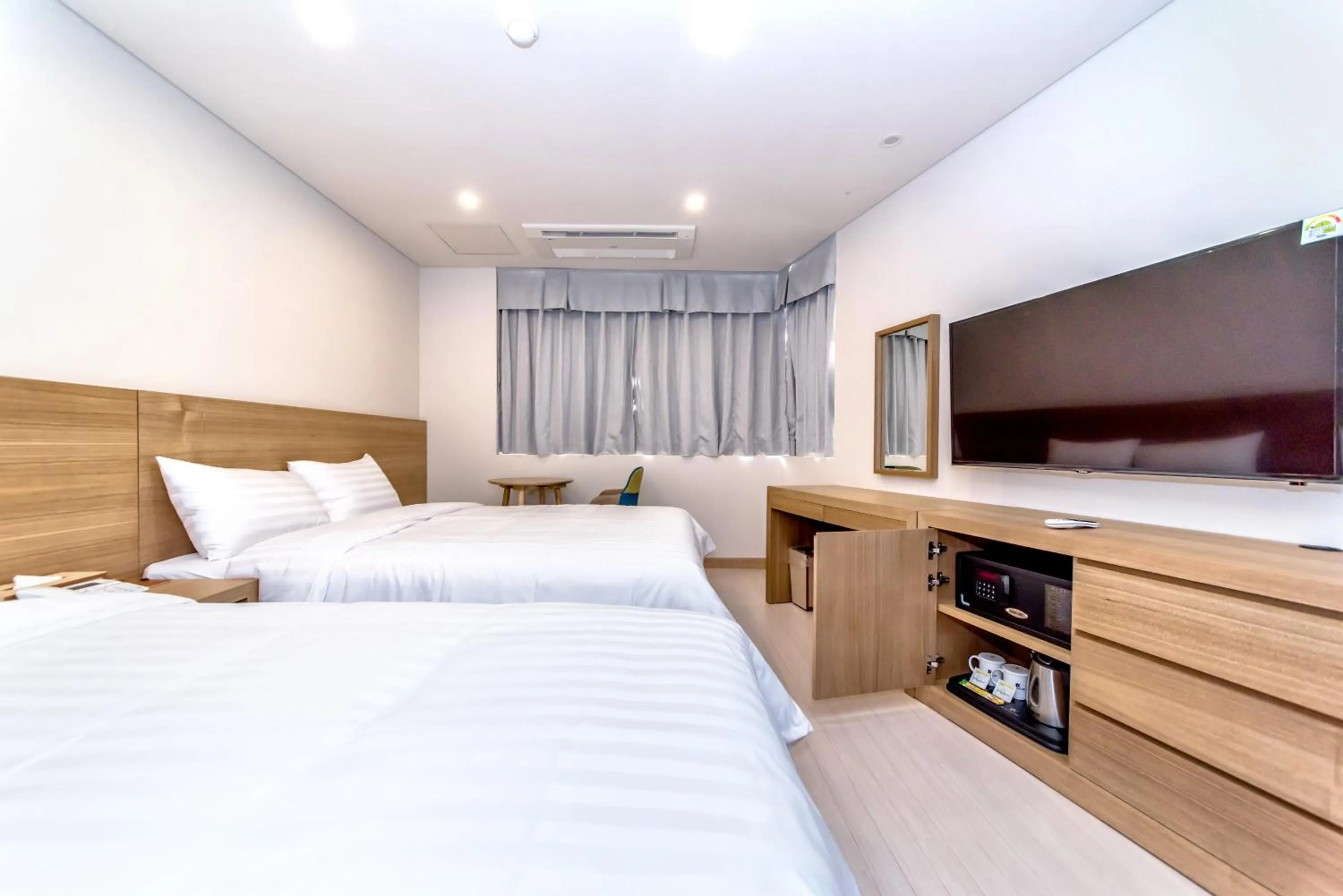 Bed in BK Hotel Jeju