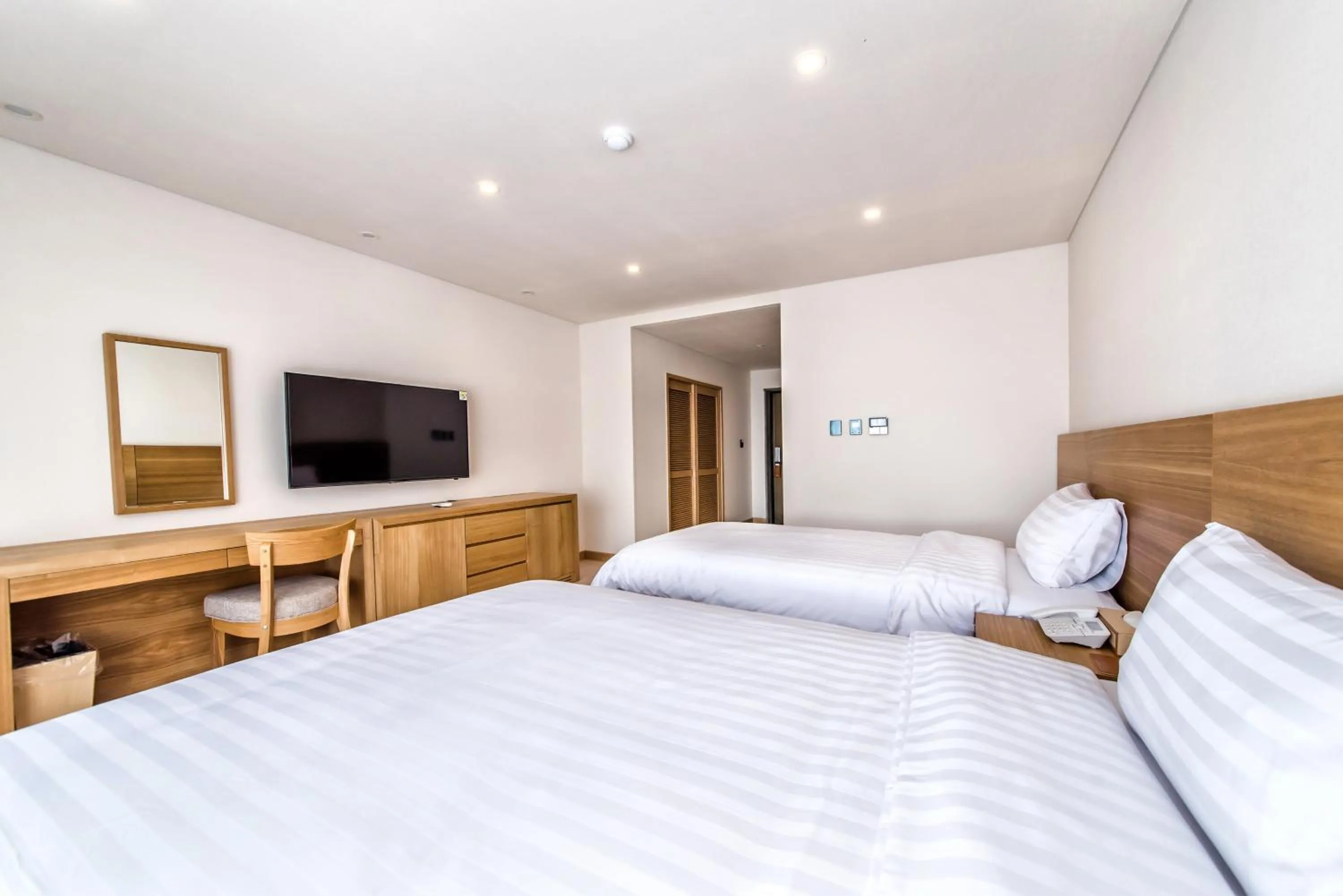 Bed in BK Hotel Jeju