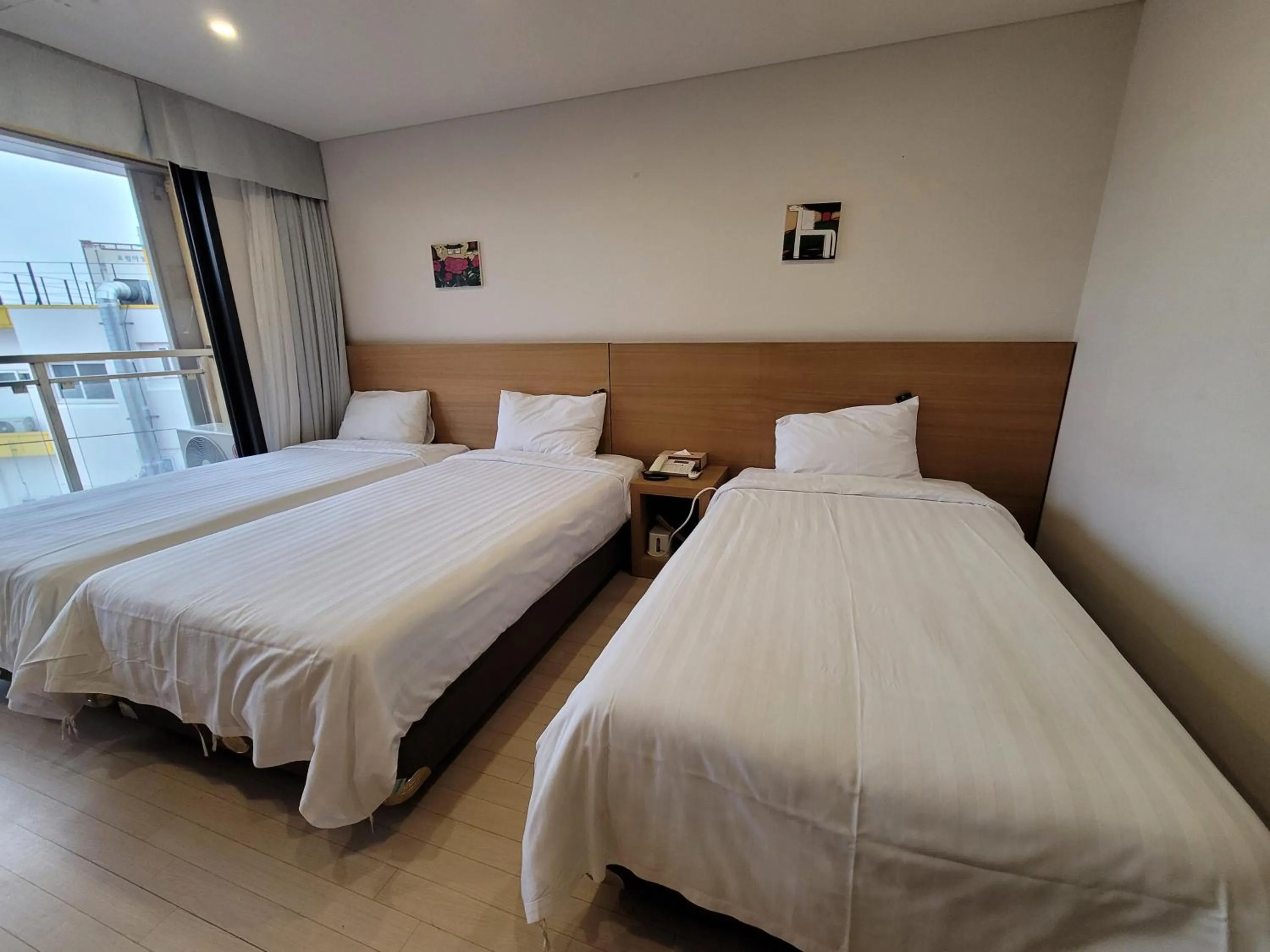 Bed in BK Hotel Jeju