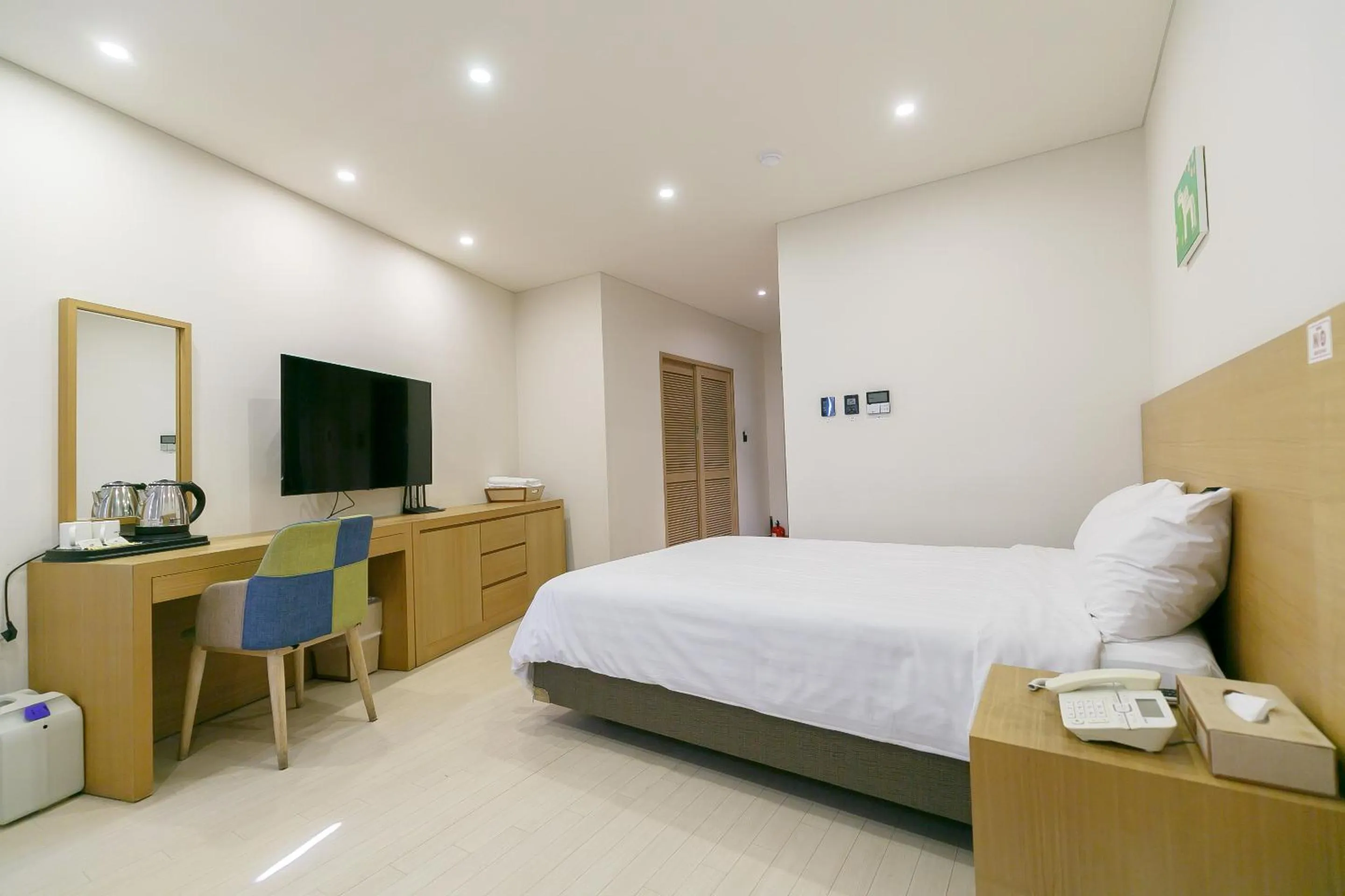 Bed in BK Hotel Jeju