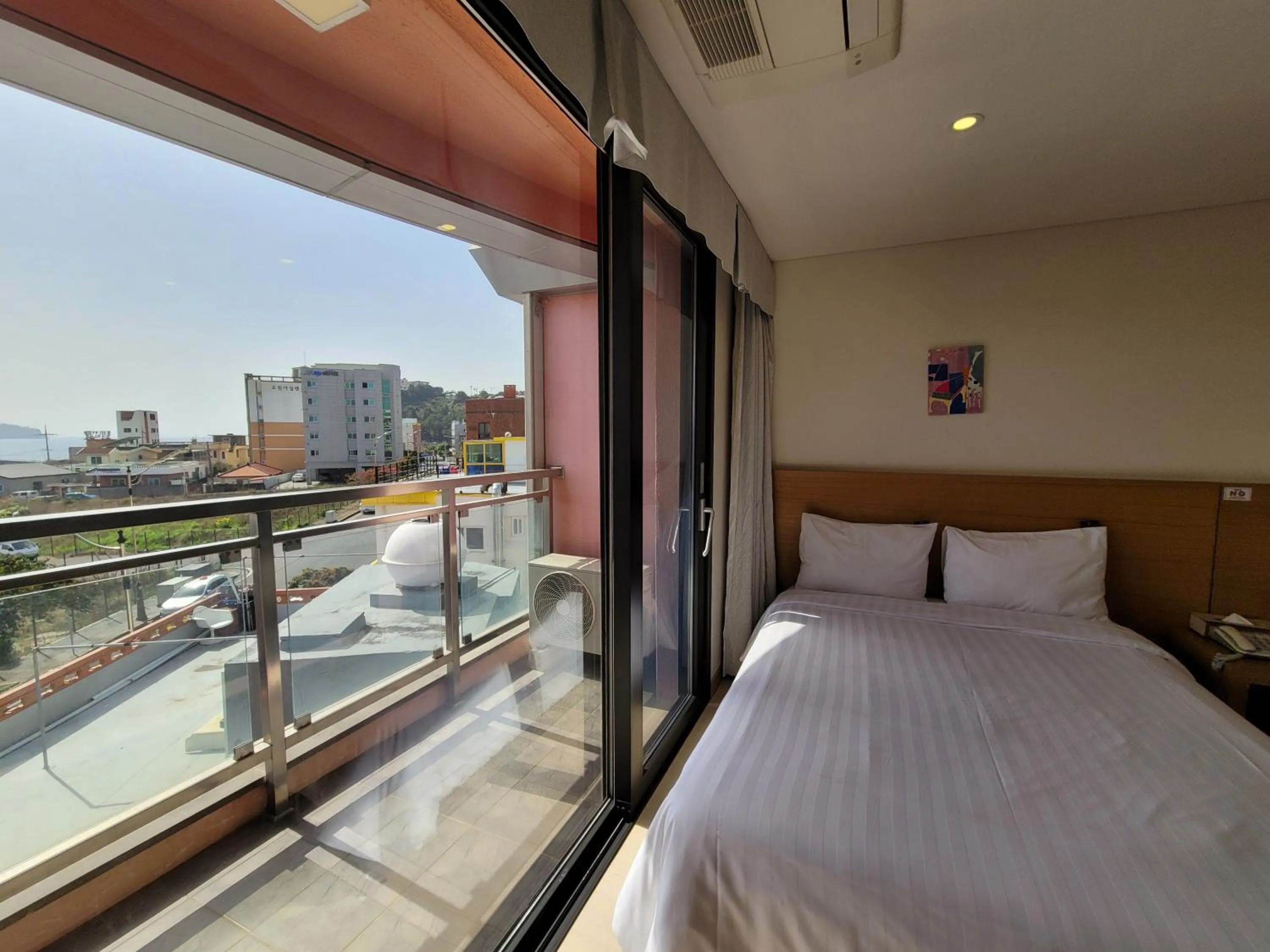 View (from property/room), Bed in BK Hotel Jeju