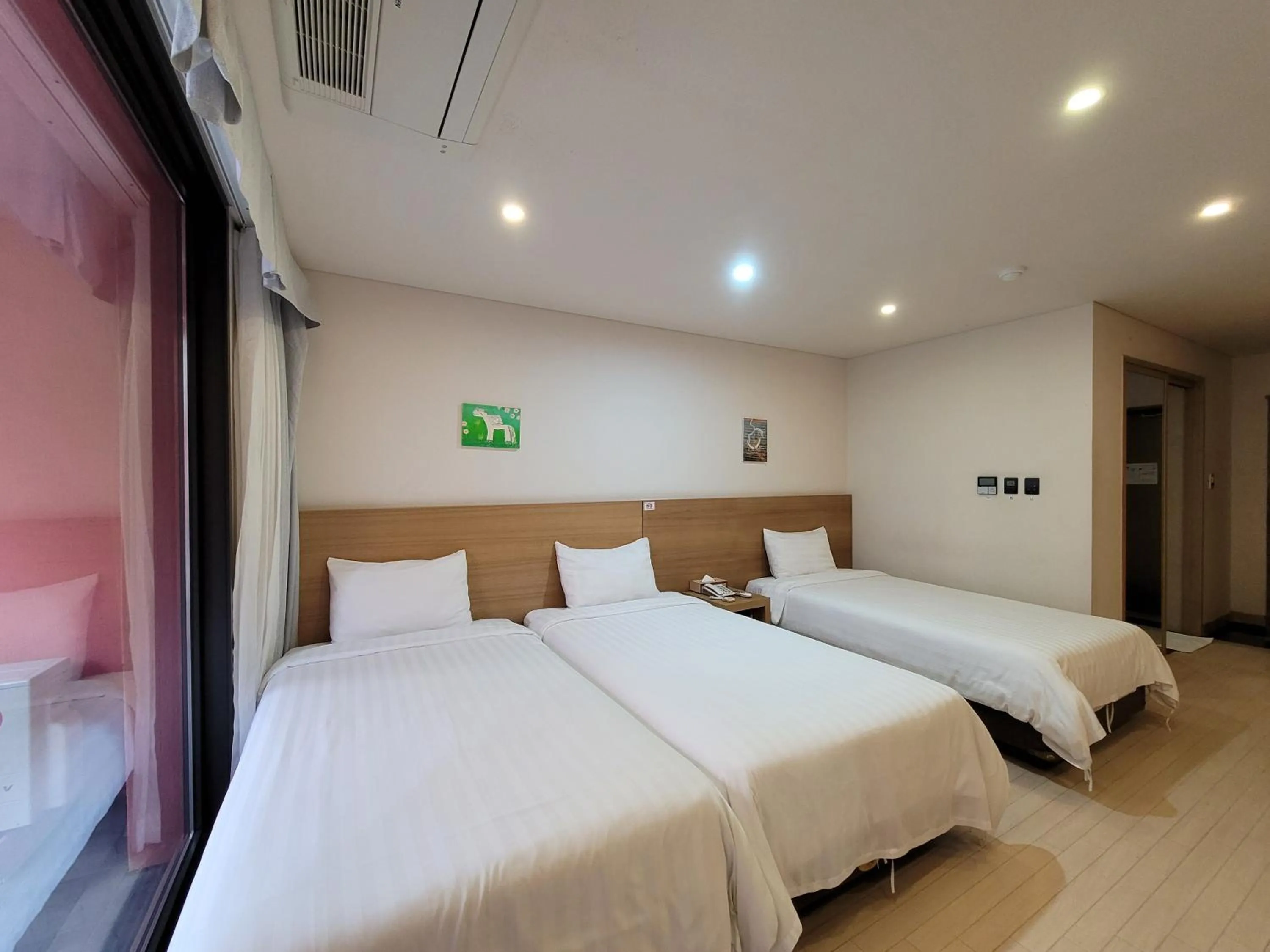 Bed in BK Hotel Jeju