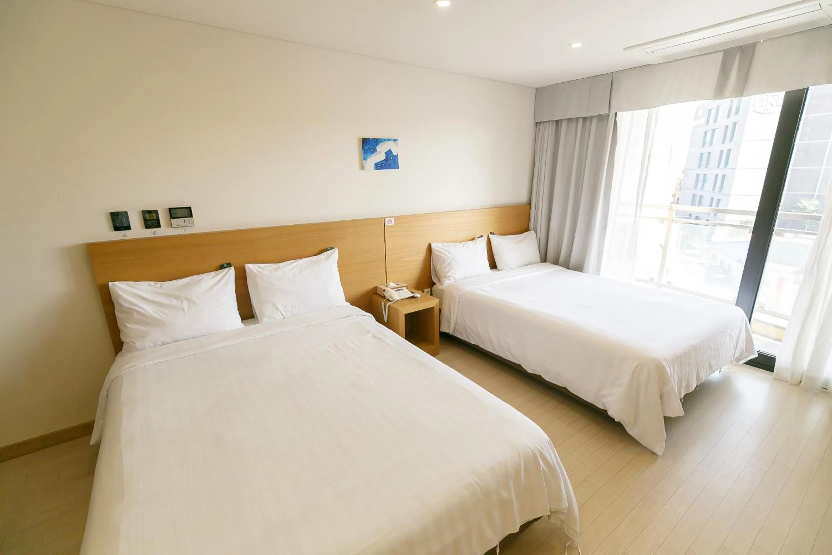 Bed in BK Hotel Jeju