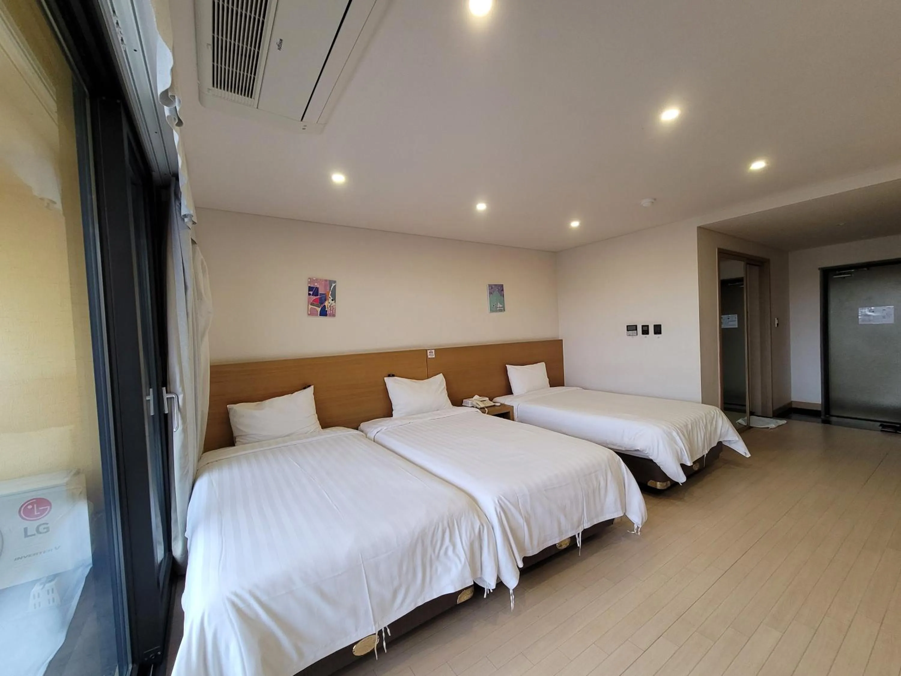 Bed in BK Hotel Jeju