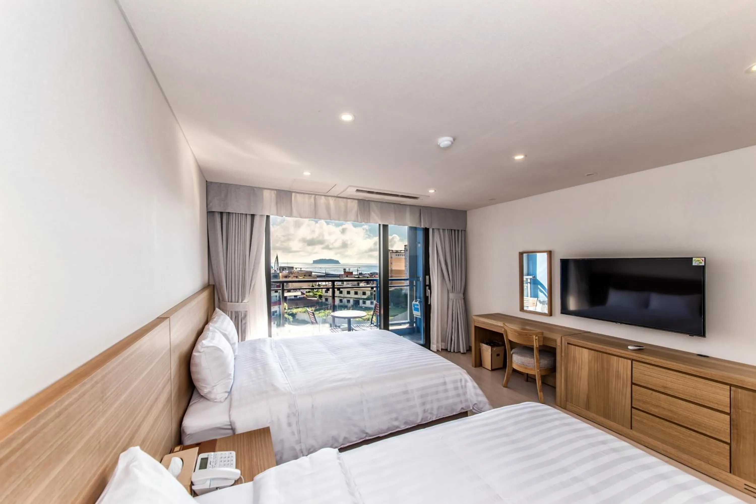 Photo of the whole room, Bed in BK Hotel Jeju