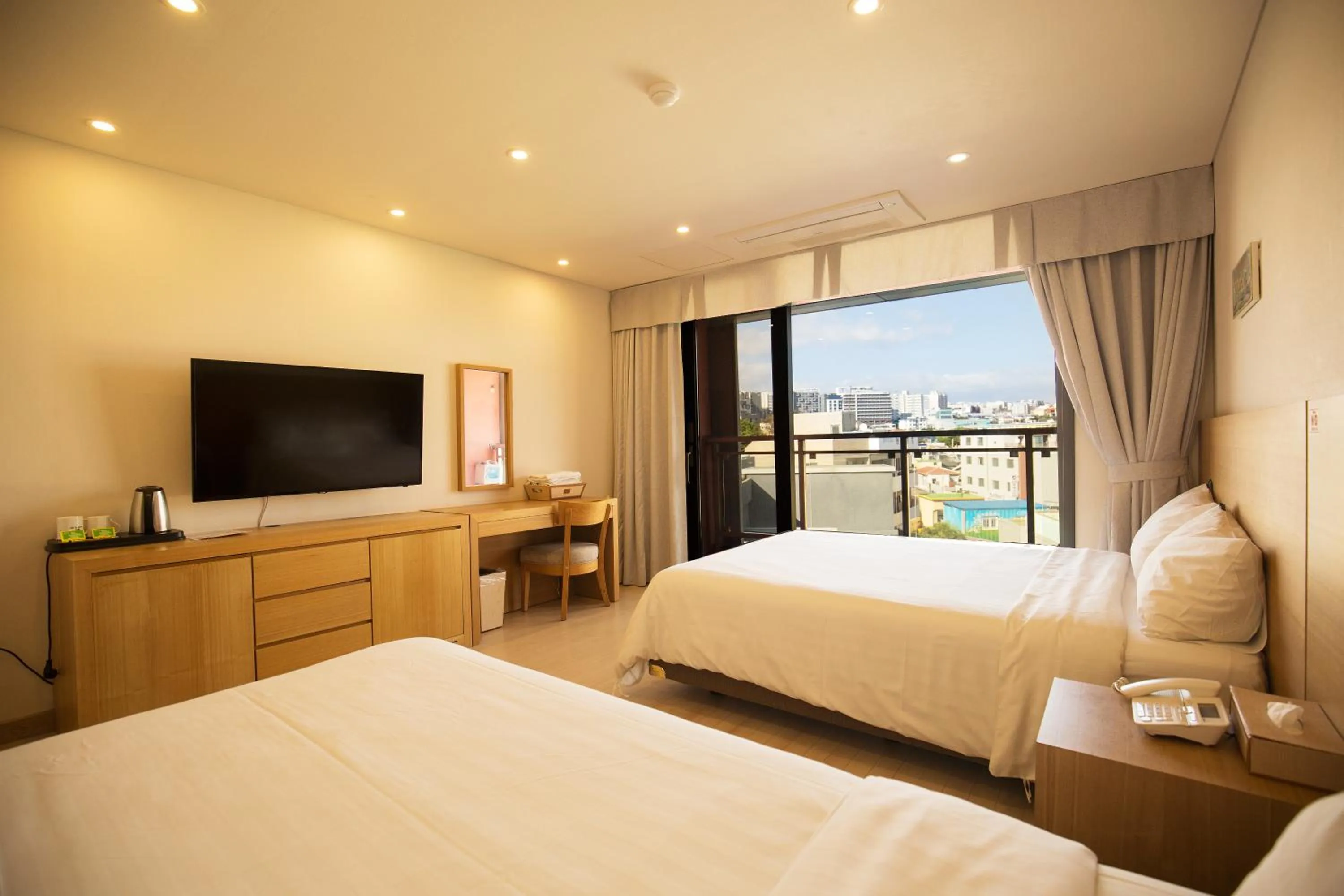 Photo of the whole room, Bed in BK Hotel Jeju